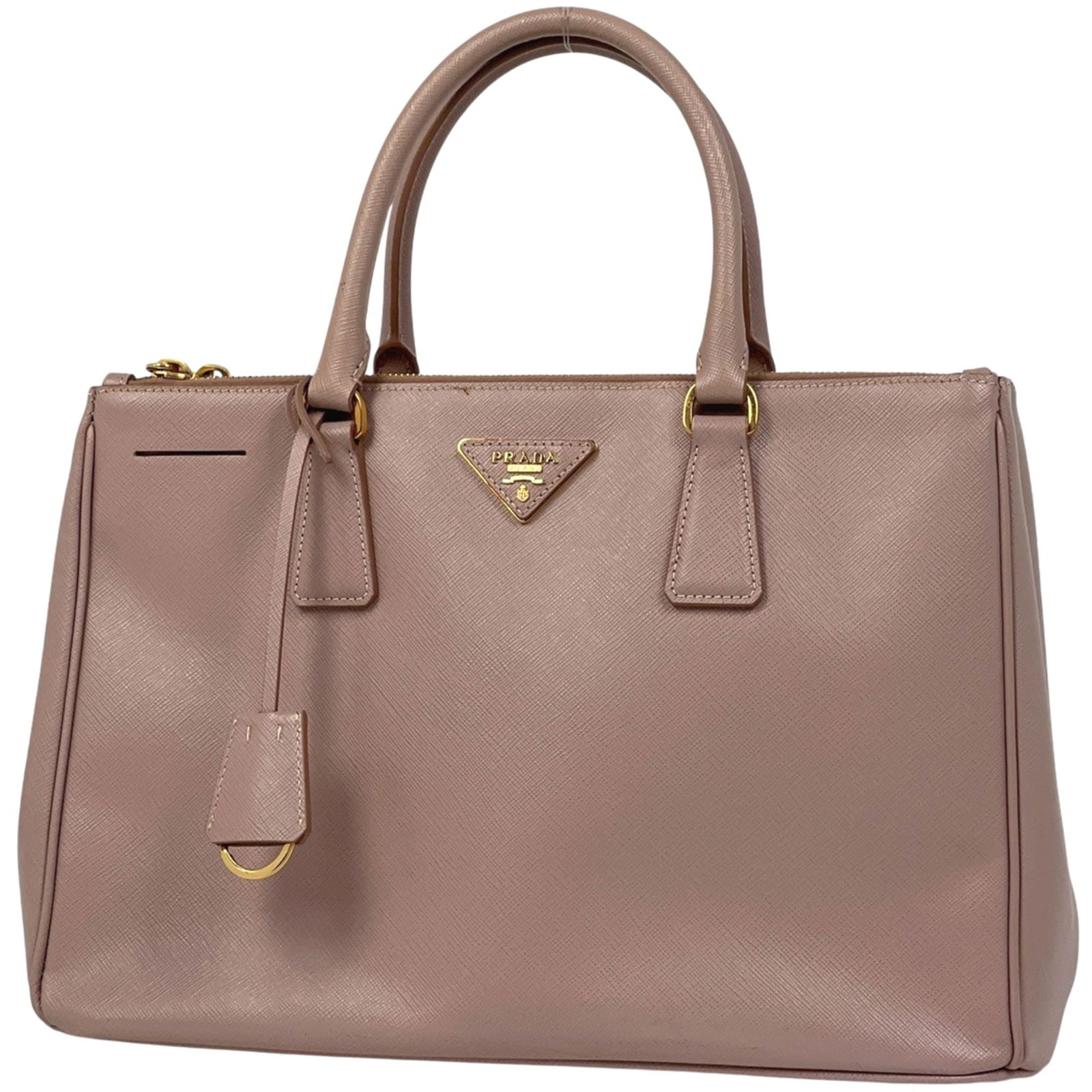 Leather - Prada Handbag Saffiano Triangle: Leather - Prada Handbag Saffiano Triangle This listing features Leather - Prada Handbag Saffiano Triangle. Item specifics are provided below. Item Specifics: Brand: Prada Type: Handbag Material: Saffi