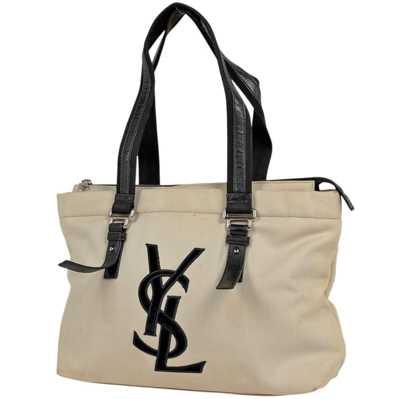 Canvas Yves Saint Laurent Tote Bag: Canvas Yves Saint Laurent Tote Bag This listing features Canvas Yves Saint Laurent Tote Bag. Item specifics are provided below. Item Specifics: Brand: Yves Saint Laurent Type: Tote Bag Material: