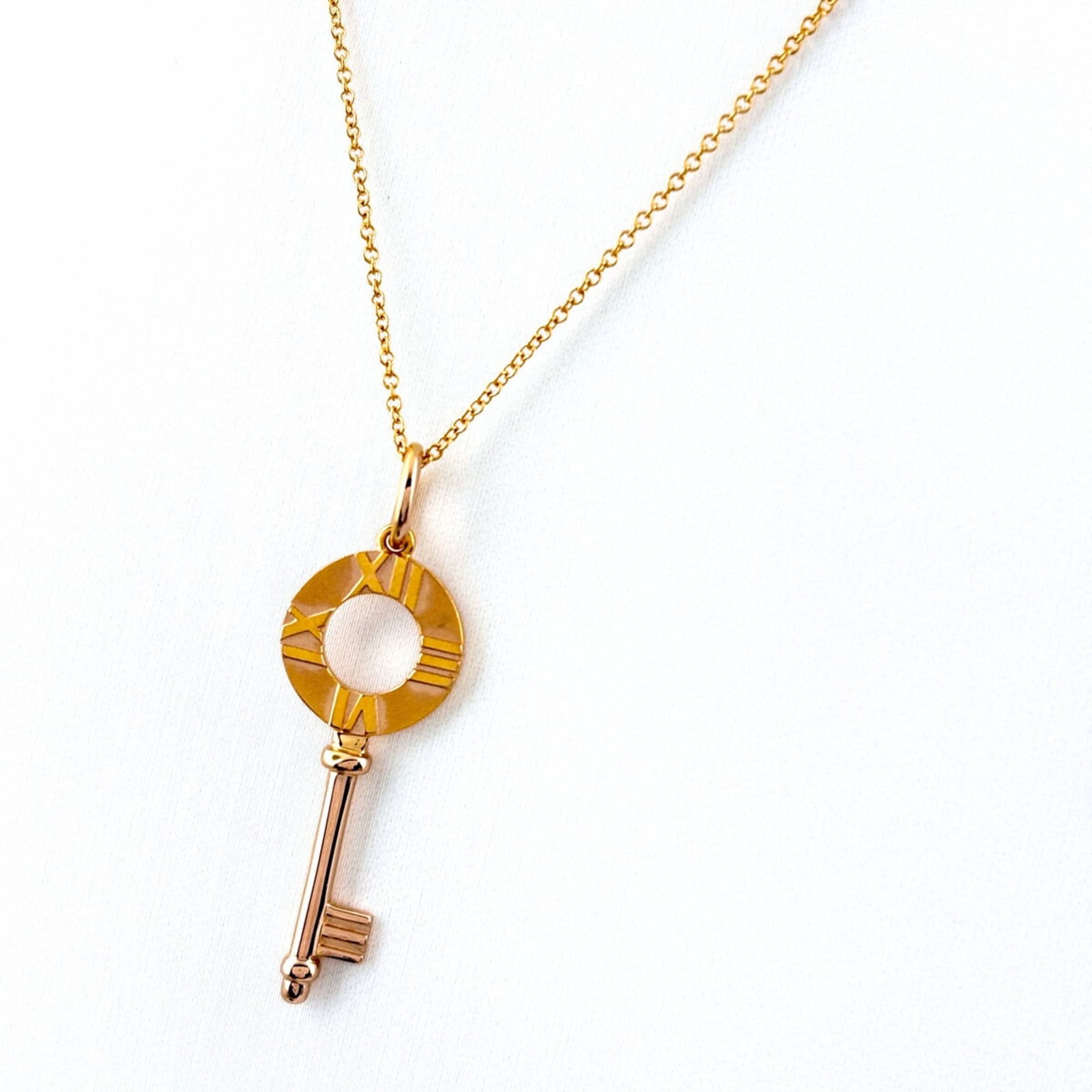 Women's - Tiffany & Co. Atlas Key Necklace - PG Pink Gold Pendant 750: Women's - Tiffany & Co. Atlas Key Necklace - PG Pink Gold Pendant 750 This listing features Women's - Tiffany & Co. Atlas Key Necklace - PG Pink Gold Pendant 750. Item specifics are provided below. It