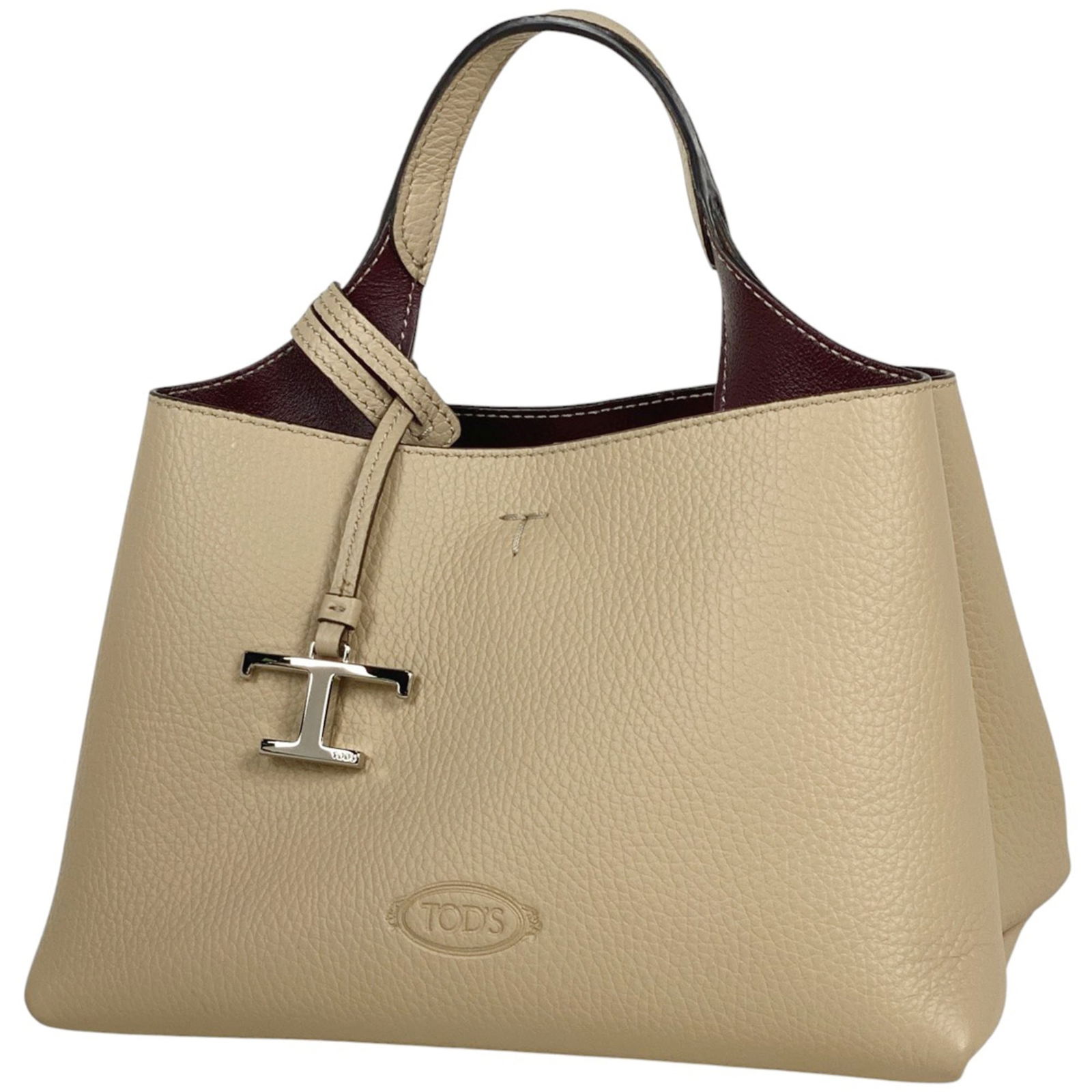 Leather Tod'S Handbag: Leather Tod'S Handbag This listing features Leather Tod'S Handbag. Item specifics are provided below. Item Specifics: Brand: Tod'S Type: Handbag Material: Leather Color: Beige Gender: Women Size (Hxwx