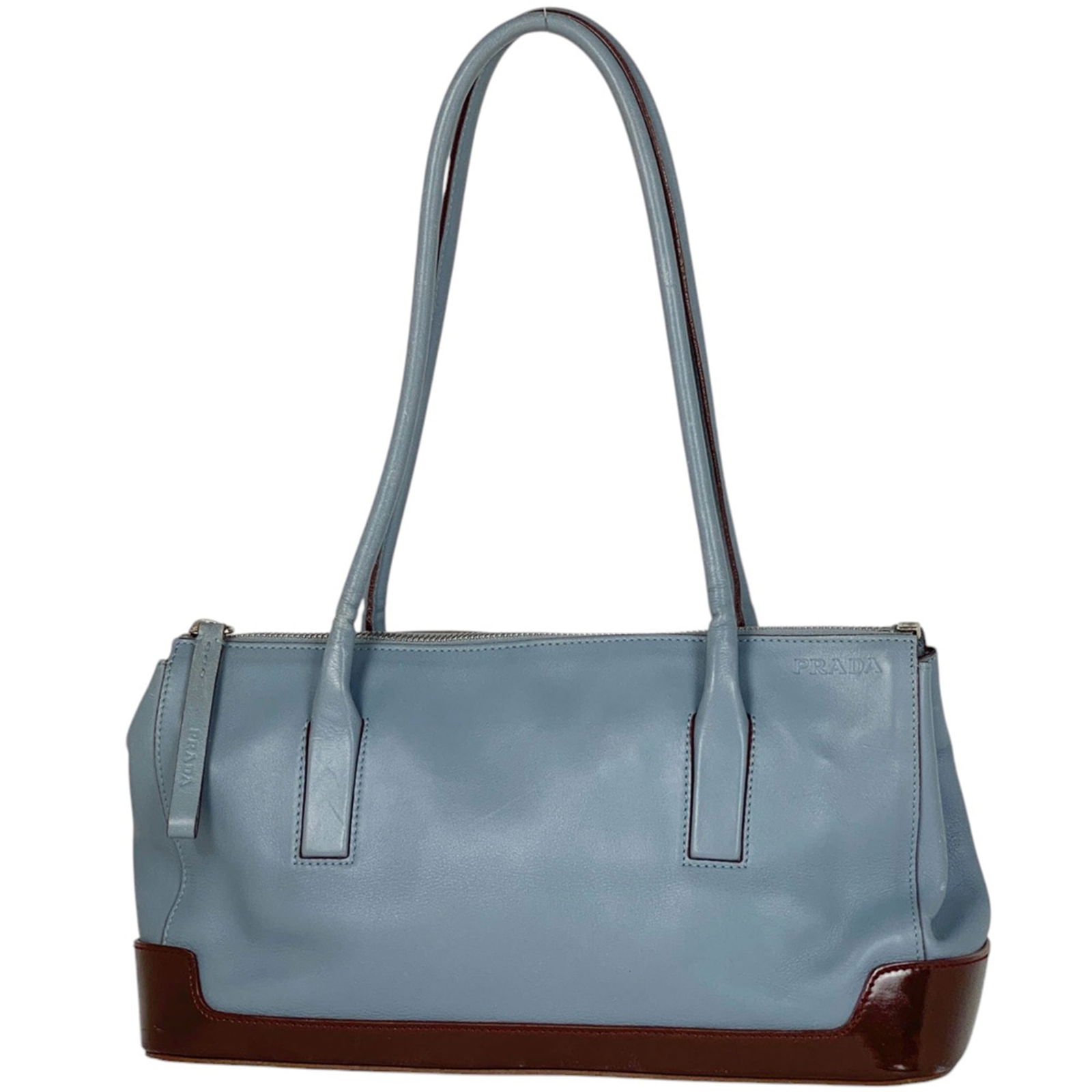 Leather Prada Shoulder Bag: Leather Prada Shoulder Bag This listing features Leather Prada Shoulder Bag. Item specifics are provided below. Item Specifics: Brand: Prada Type: Shoulder Bag Material: Leather Color: Brown, Light Bl