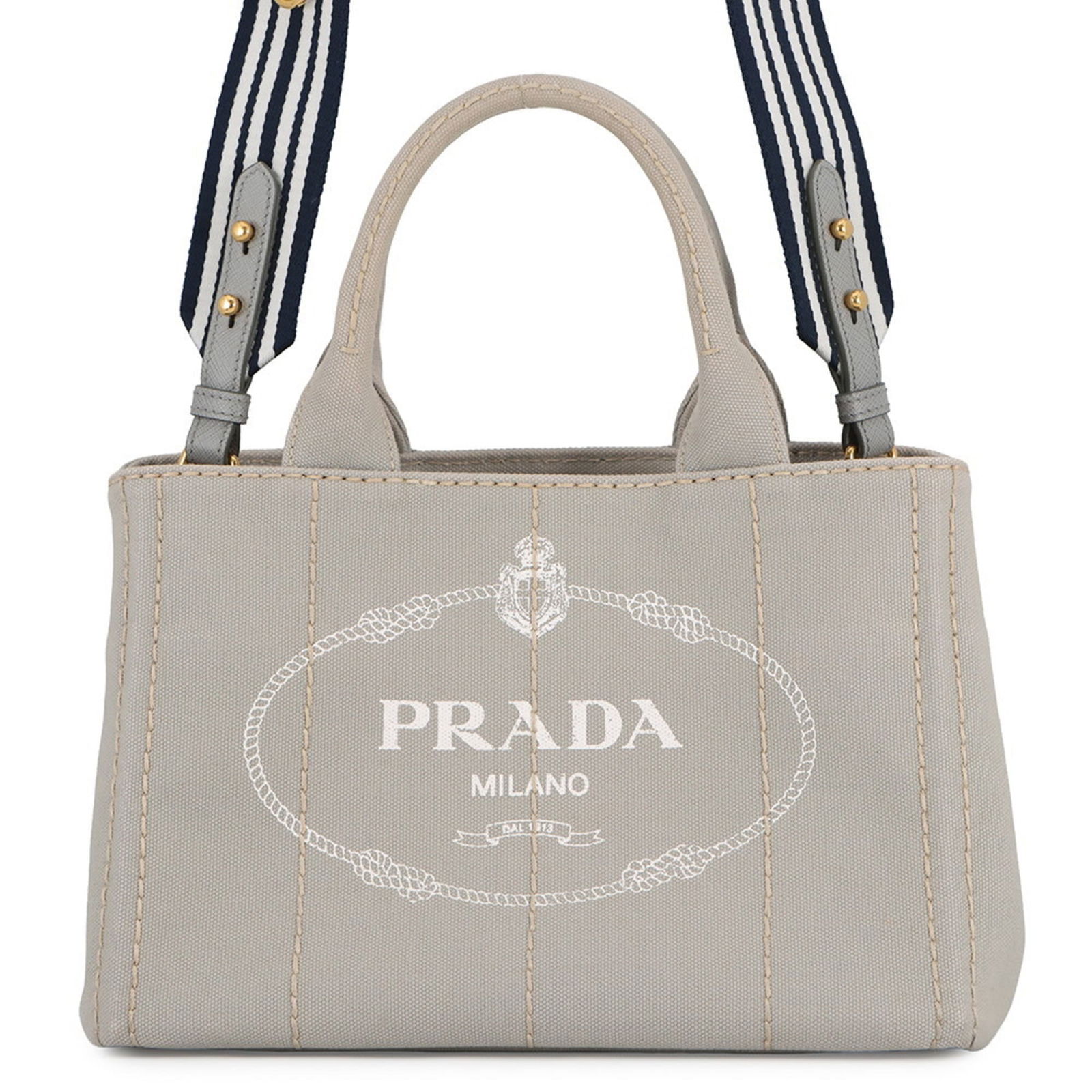Canvas Prada Tote Bag: Canvas Prada Tote Bag This listing features Canvas Prada Tote Bag. Item specifics are provided below. Item Specifics: Brand: Prada Type: Tote Bag Material: Canvas Color: Gray Hardware Color: Gold Gend