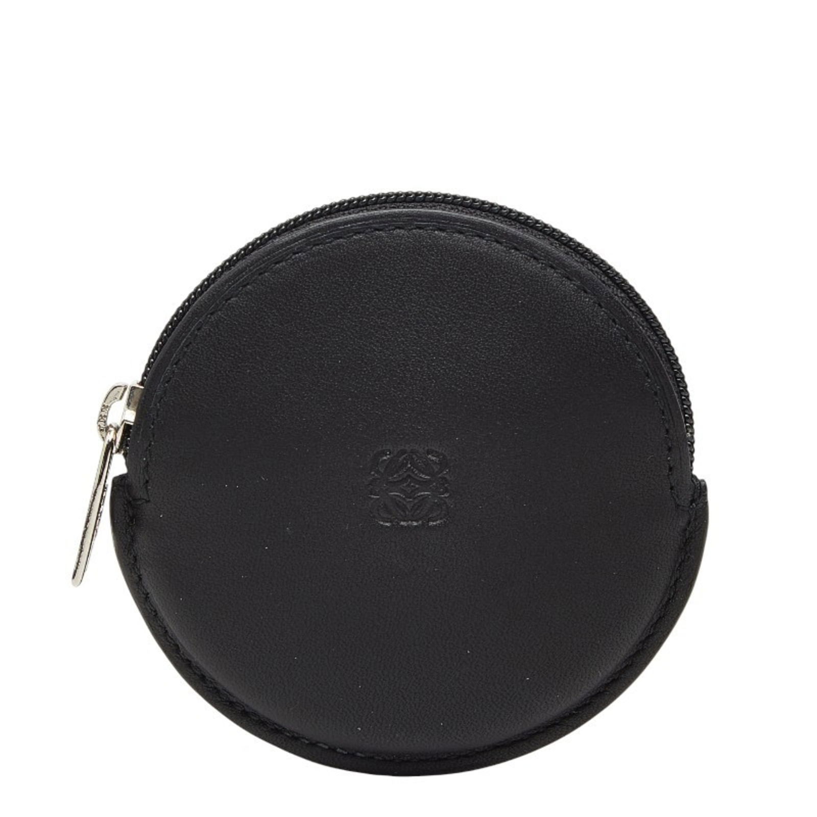 Leather Loewe Coin Purse/ Coin Case: Leather Loewe Coin Purse/ Coin Case This listing features Leather Loewe Coin Purse/ Coin Case. Item specifics are provided below. Item Specifics: Brand: Loewe Type: Coin Purse/Coin Case Gender: Women