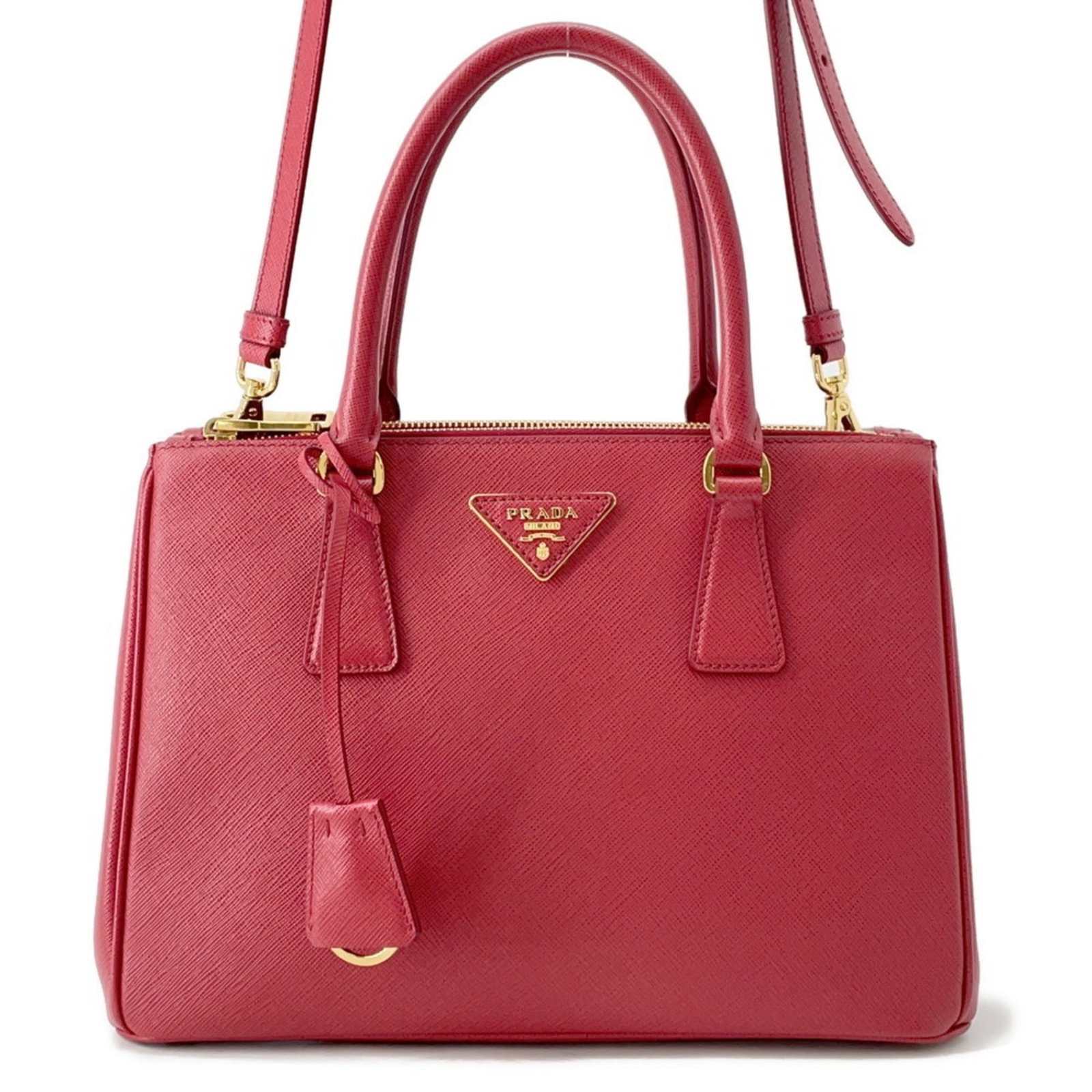 Leather Prada Handbag: Leather Prada Handbag This listing features Leather Prada Handbag. Item specifics are provided below. Item Specifics: Brand: Prada Type: Handbag Material: Leather Color: Red Color Hardware Color: Gold