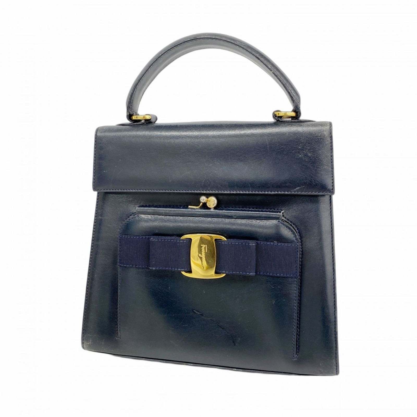 Leather Salvatore Ferragamo Handbag: Leather Salvatore Ferragamo Handbag This listing features Leather Salvatore Ferragamo Handbag. Item specifics are provided below. Item Specifics: Brand: Salvatore Ferragamo Type: Handbag Material: Lea