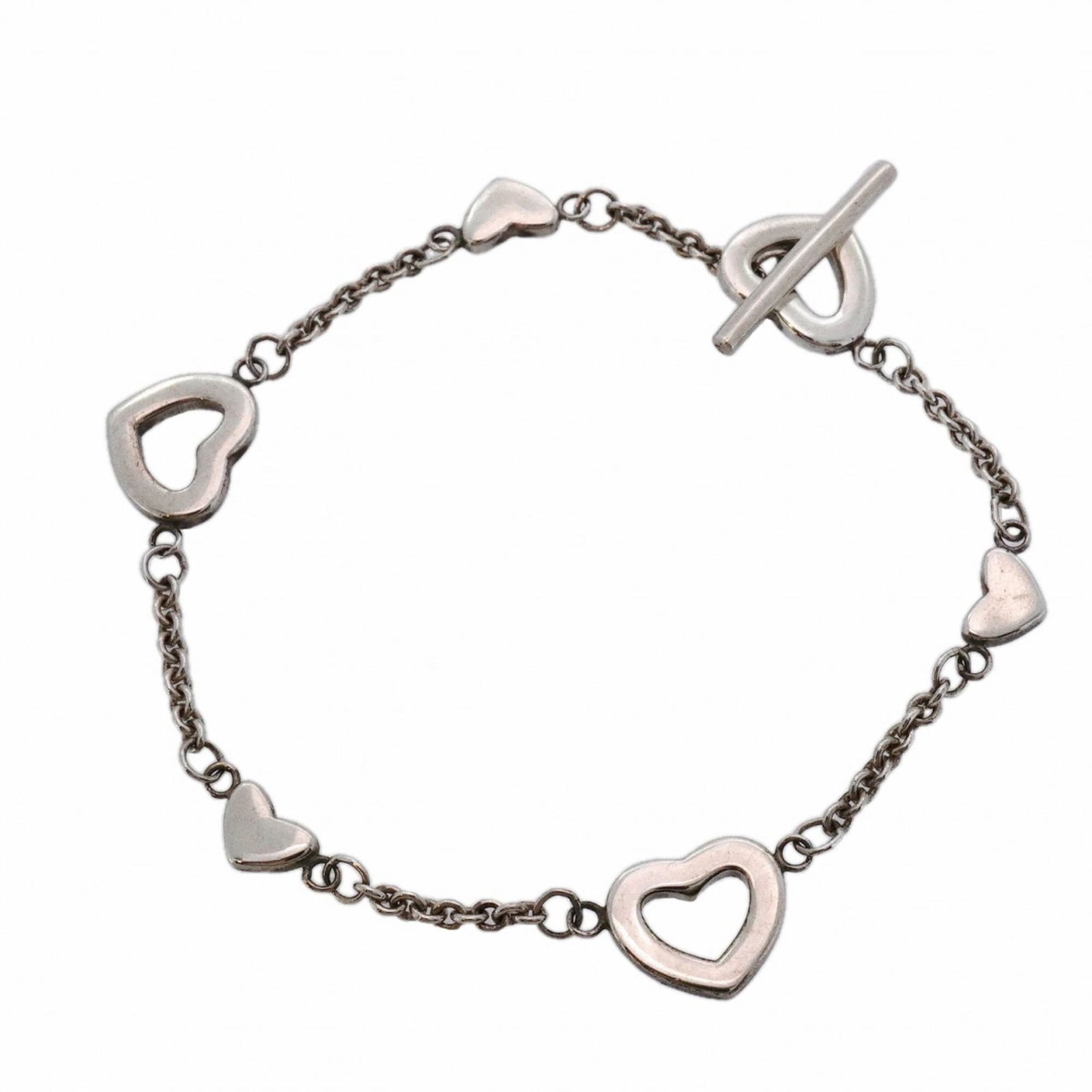 925 Tiffany Charm Bracelet Silver: 925 Tiffany Charm Bracelet Silver This listing features 925 Tiffany Charm Bracelet Silver. Item specifics are provided below. Item Specifics: Brand: Tiffany Type: Charm Bracelet Gender: Women Material