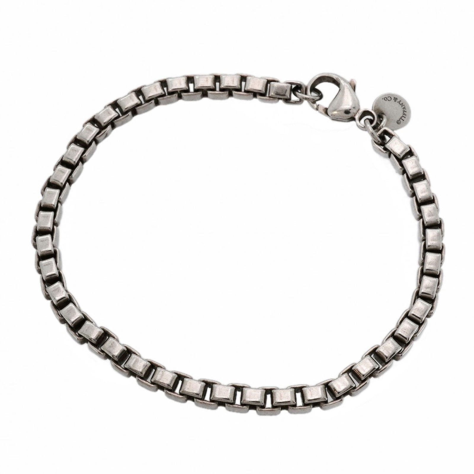 925 Tiffany Charm Bracelet Silver: 925 Tiffany Charm Bracelet Silver This listing features 925 Tiffany Charm Bracelet Silver. Item specifics are provided below. Item Specifics: Brand: Tiffany Type: Charm Bracelet Gender: Women Material