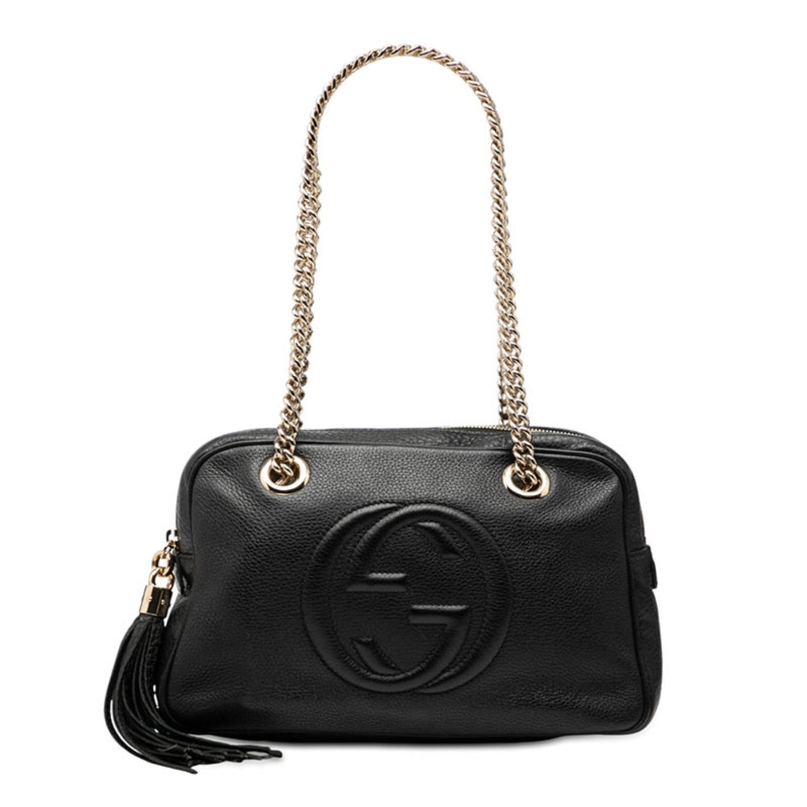 Leather Gucci Shoulder Bag: Leather Gucci Shoulder Bag This listing features Leather Gucci Shoulder Bag. Item specifics are provided below. Item Specifics: Brand: Gucci Type: Shoulder Bag Material: Leather Color: Black Gender: W
