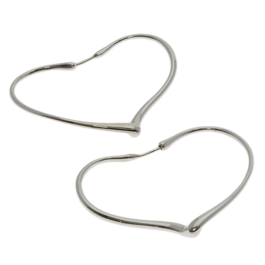 Silver TIFFANY&Co. Open heart hoop earring: Silver TIFFANY&Co. Open heart hoop earring This listing features Silver TIFFANY&Co. Open heart hoop earring. Item specifics are provided below. Item Specifics: Brand: TIFFANY&Co. Style: earring