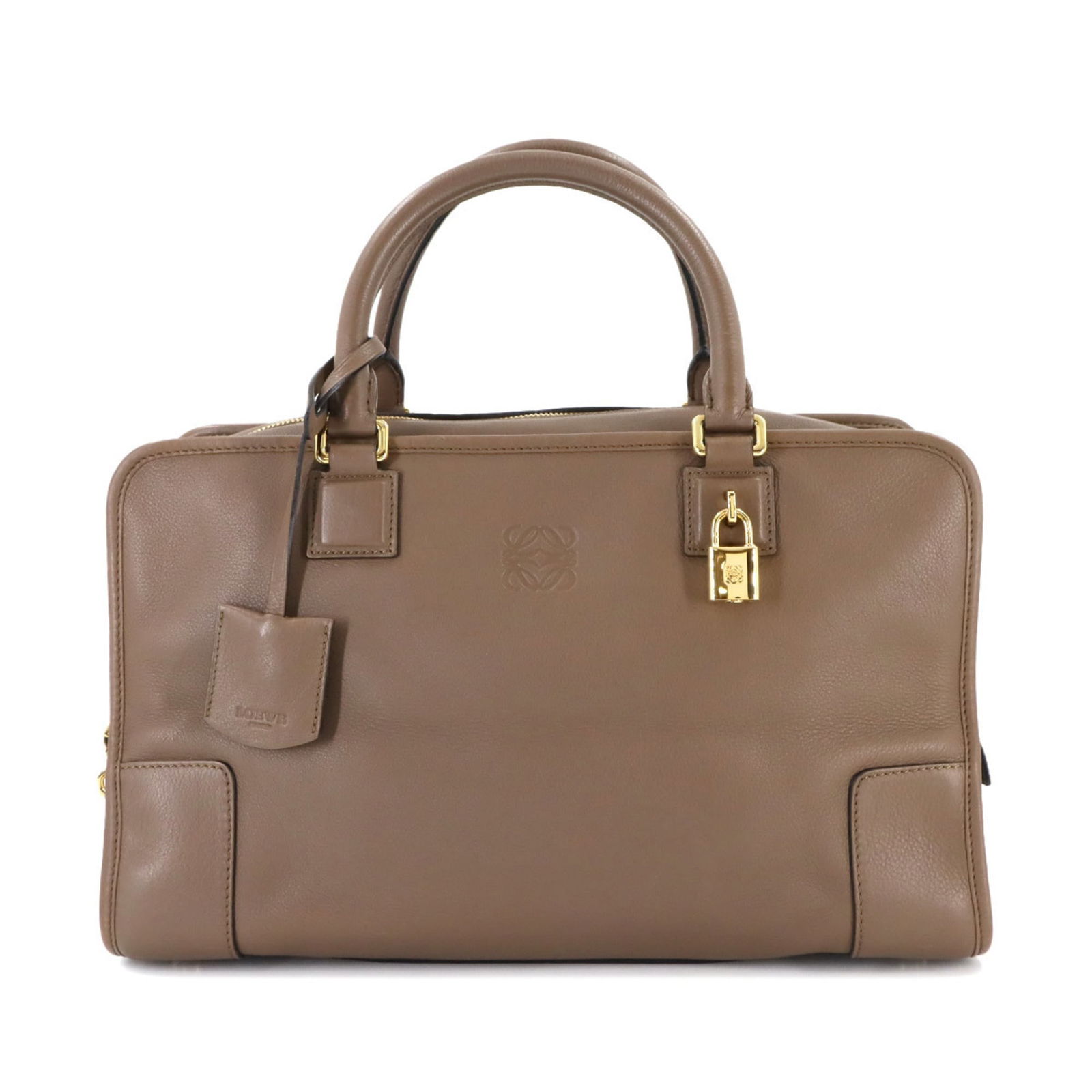 Leather Loewe Handbag: Leather Loewe Handbag This listing features Leather Loewe Handbag. Item specifics are provided below. Item Specifics: Brand: Loewe Type: Handbag Material: Leather Color: Brown Gender: Women Size
