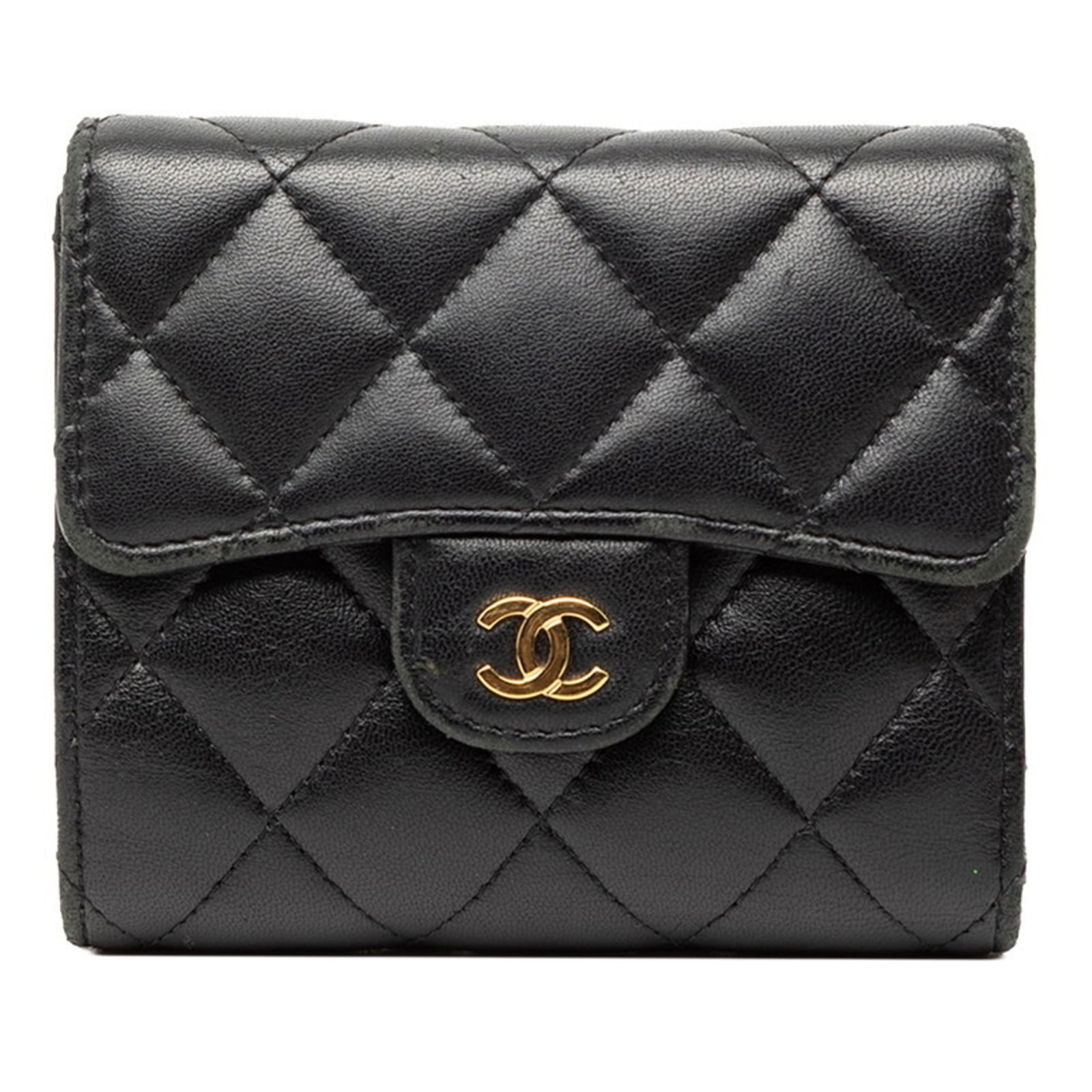 Leather Chanel Wallet (Tri-Fold): Leather Chanel Wallet (Tri-Fold) This listing features Leather Chanel Wallet (Tri-Fold). Item specifics are provided below. Item Specifics: Brand: Chanel Type: Wallet (Tri-Fold) Gender: Women Material