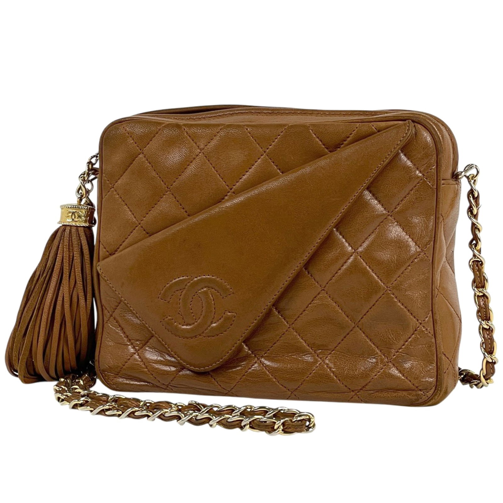 Leather Chanel Shoulder Bag: Leather Chanel Shoulder Bag This listing features Leather Chanel Shoulder Bag. Item specifics are provided below. Item Specifics: Brand: Chanel Type: Shoulder Bag Material: Leather Color: Brown Gender