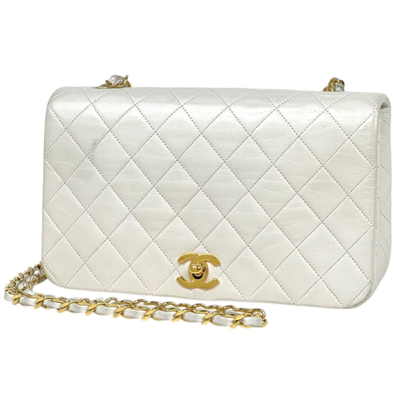 Leather Chanel Shoulder Bag: Leather Chanel Shoulder Bag This listing features Leather Chanel Shoulder Bag. Item specifics are provided below. Item Specifics: Brand: Chanel Type: Shoulder Bag Material: Leather Color: White Gender