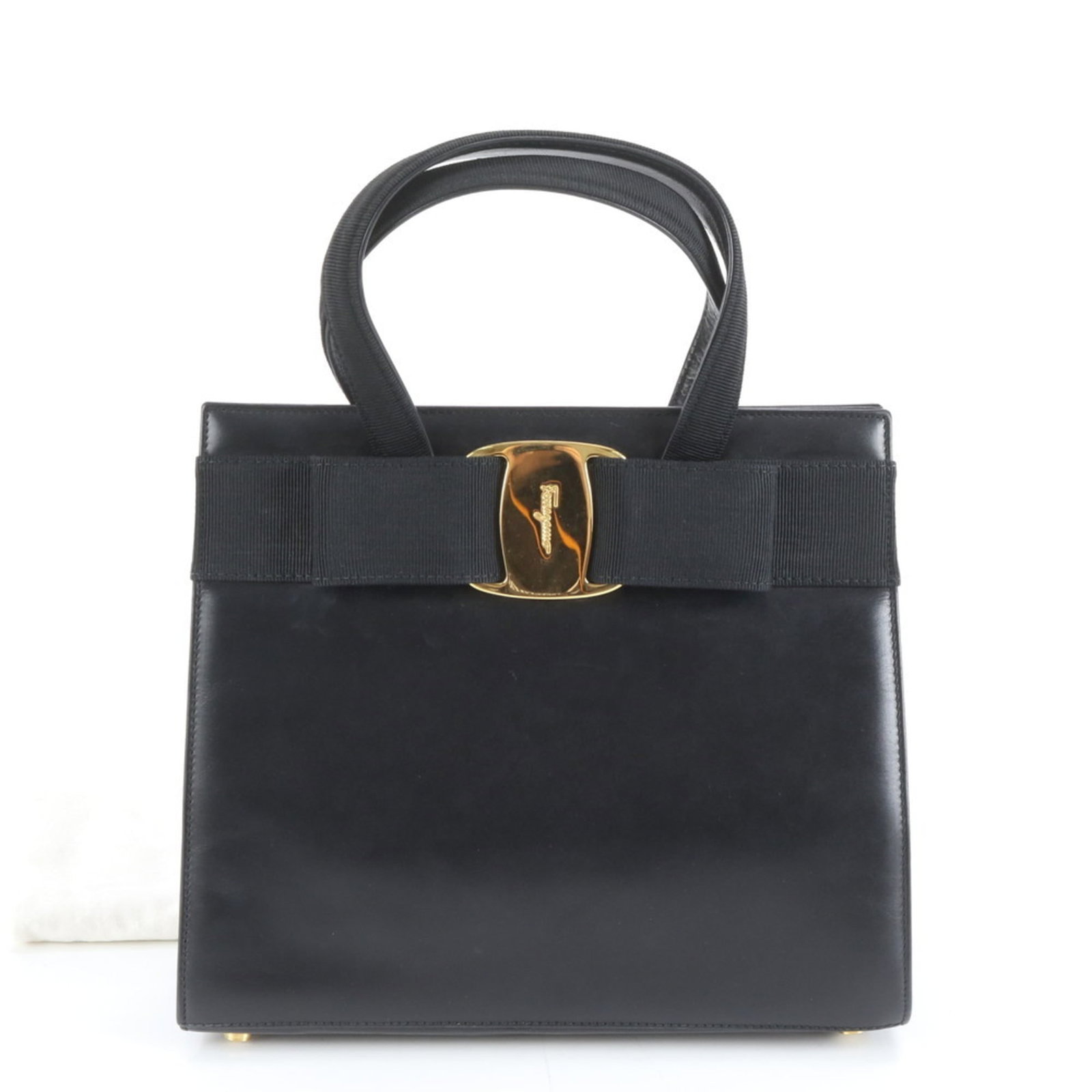 Leather Salvatore Ferragamo Handbag: Leather Salvatore Ferragamo Handbag This listing features Leather Salvatore Ferragamo Handbag. Item specifics are provided below. Item Specifics: Brand: Salvatore Ferragamo Type: Handbag Material: