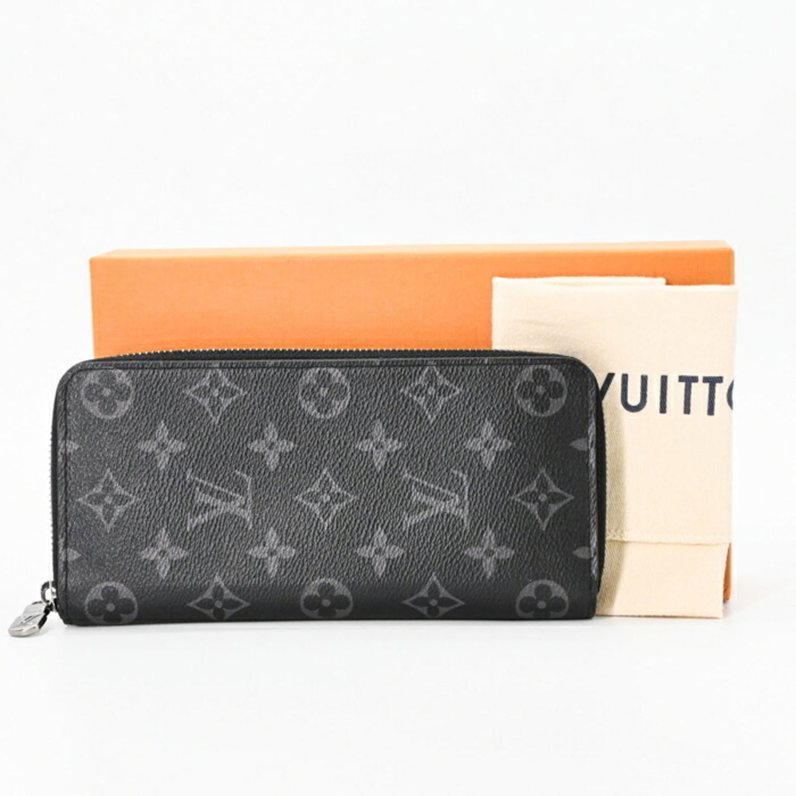 Eclipse Louis Vuitton Long Wallet (Bi-Fold) Monogram: Eclipse Louis Vuitton Long Wallet (Bi-Fold) Monogram This listing features Eclipse Louis Vuitton Long Wallet (Bi-Fold) Monogram. Item specifics are provided below. Item Specifics: Brand: Louis Vuitton
