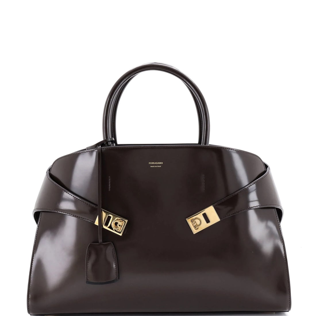 Large Salvatore Ferragamo Hug Top Handle Bag Leather: Large Salvatore Ferragamo Hug Top Handle Bag Leather This listing features Large Salvatore Ferragamo Hug Top Handle Bag Leather. Item specifics are provided below. Item Specifics: Brand: Salvatore Fer