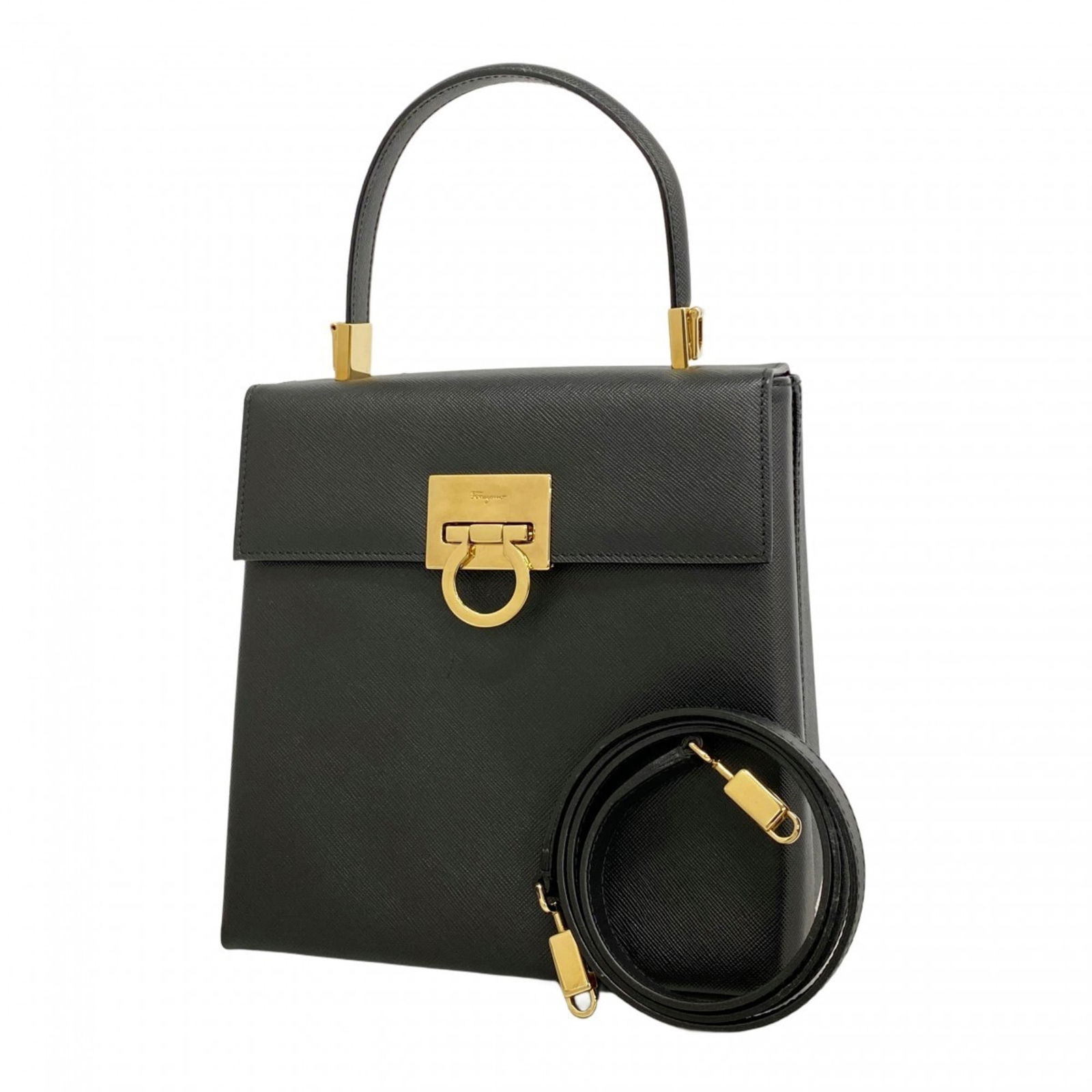 Leather Salvatore Ferragamo Handbag: Leather Salvatore Ferragamo Handbag This listing features Leather Salvatore Ferragamo Handbag. Item specifics are provided below. Item Specifics: Brand: Salvatore Ferragamo Type: Handbag Material: Lea