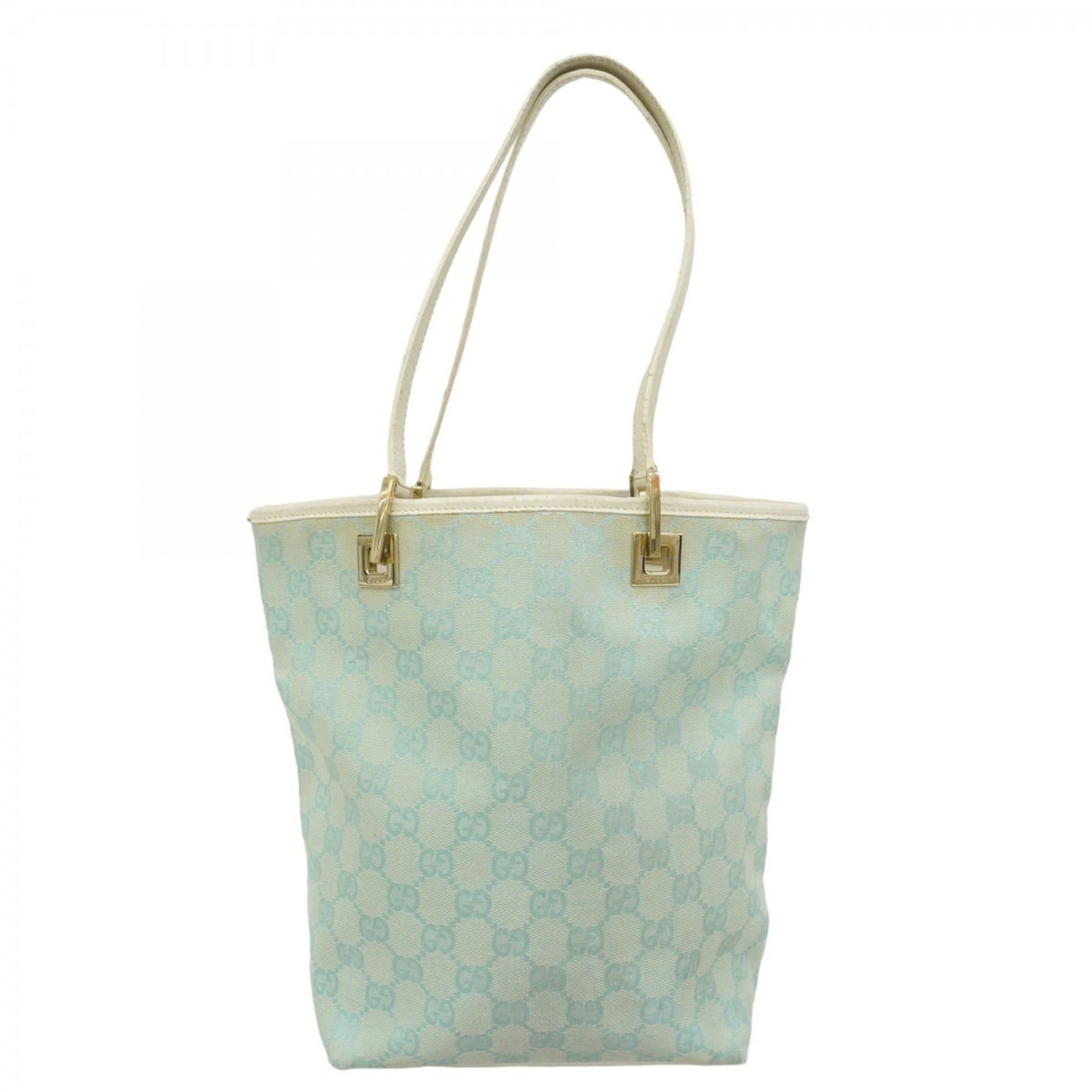 Canvas Gucci Tote Bag: Canvas Gucci Tote Bag This listing features Canvas Gucci Tote Bag. Item specifics are provided below. Item Specifics: Brand: Gucci Type: Tote Bag Material: Canvas Color: Light Blue, White Hardware Col