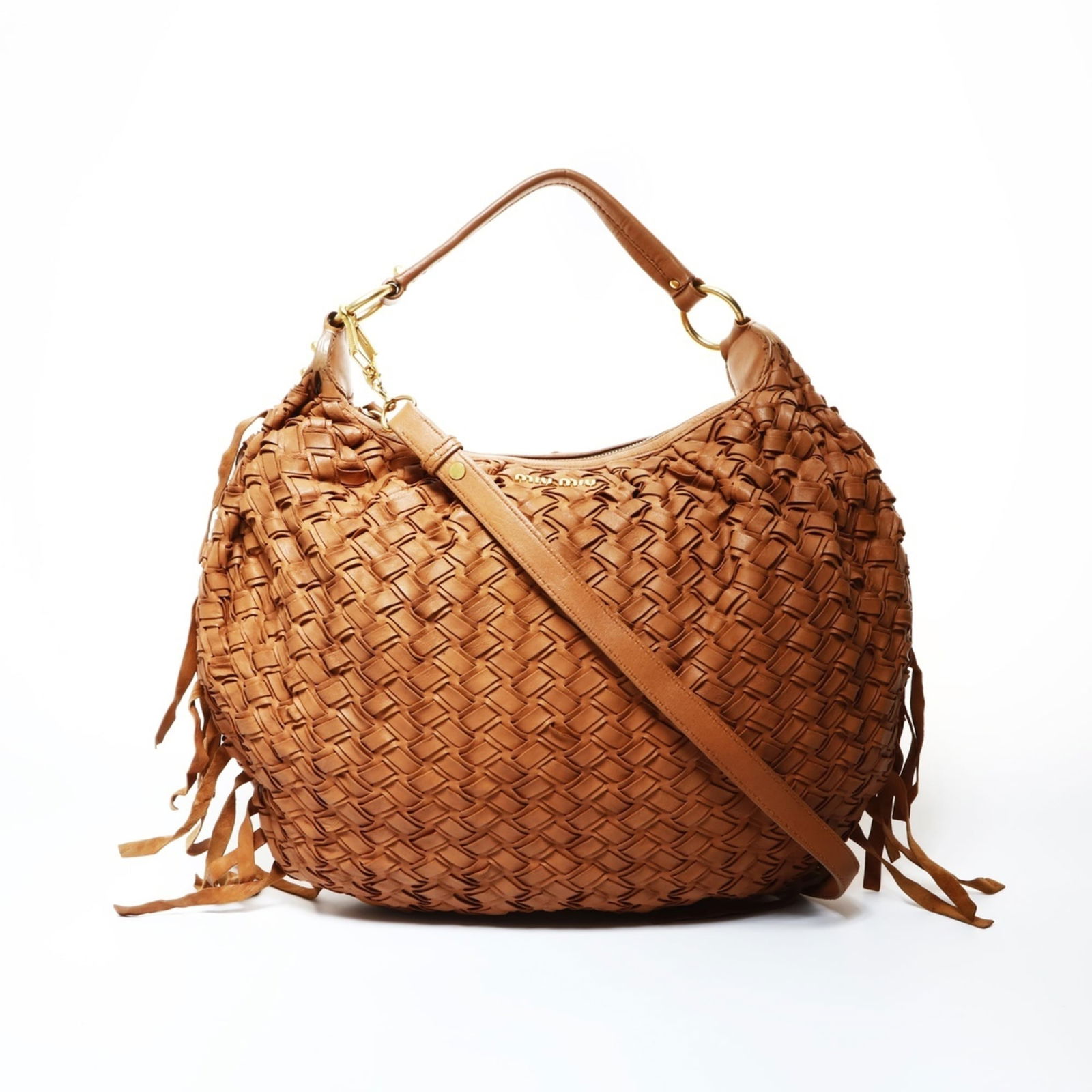 Leather Miu Shoulder Bag: Leather Miu Shoulder Bag This listing features Leather Miu Shoulder Bag. Item specifics are provided below. Item Specifics: Brand: Miu Miu Type: Shoulder Bag Material: Leather Color: Brown Gender: