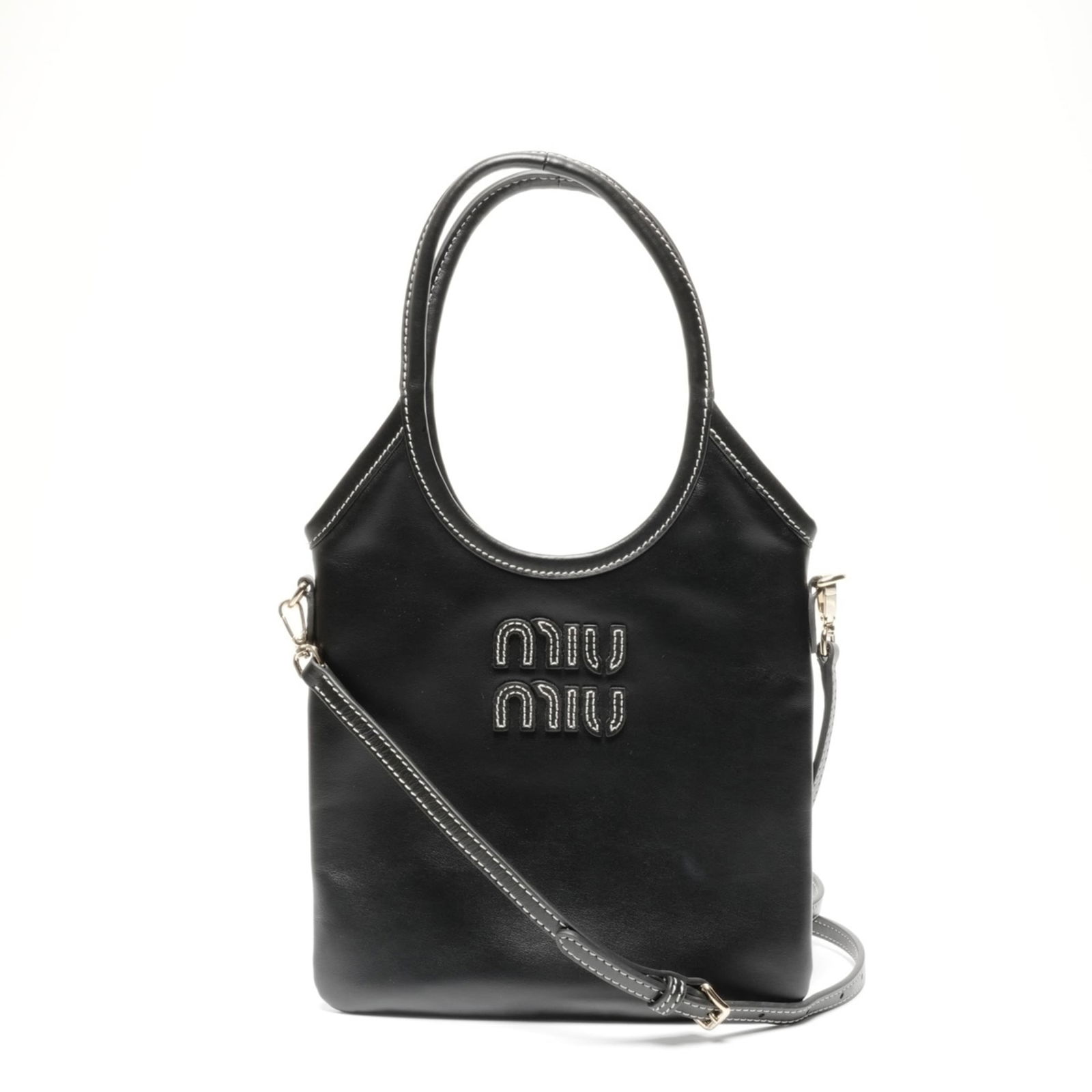 Leather Miu Handbag: Leather Miu Handbag This listing features Leather Miu Handbag. Item specifics are provided below. Item Specifics: Brand: Miu Miu Type: Handbag Material: Leather Color: Black Gender: Women Size (Hxwxd)