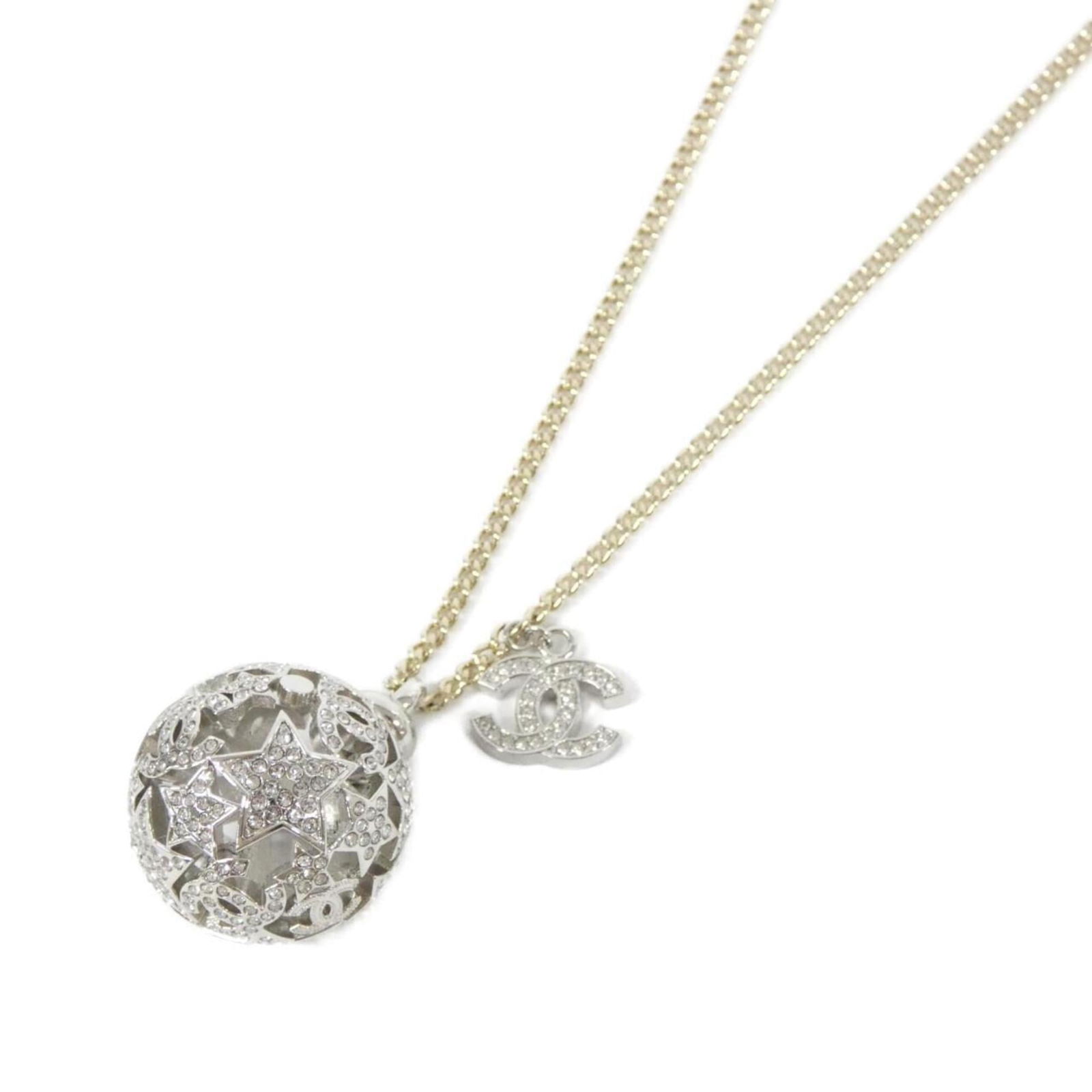 Necklace Chanel ABG025: Necklace Chanel ABG025 This listing features Necklace Chanel ABG025. Item specifics are provided below. Item Specifics: Brand: Chanel Necklace Type: Necklace Gender: Women Color: Clear, Gold, Silver N