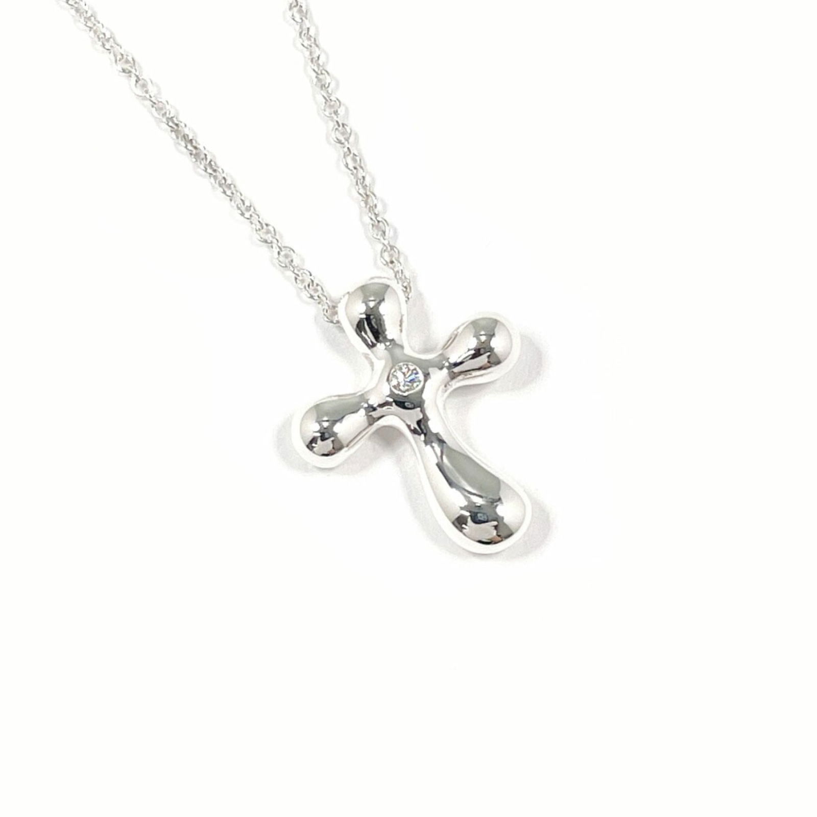 Women TIFFANY & Co. Tiffany Cross Elsa Peretti Necklace in 925 Sterling Silver with Diamonds for: Women TIFFANY & Co. Tiffany Cross Elsa Peretti Necklace in 925 Sterling Silver with Diamonds for This listing features Women TIFFANY & Co. Tiffany Cross Elsa Peretti Necklace in 925 Sterling Silver wi