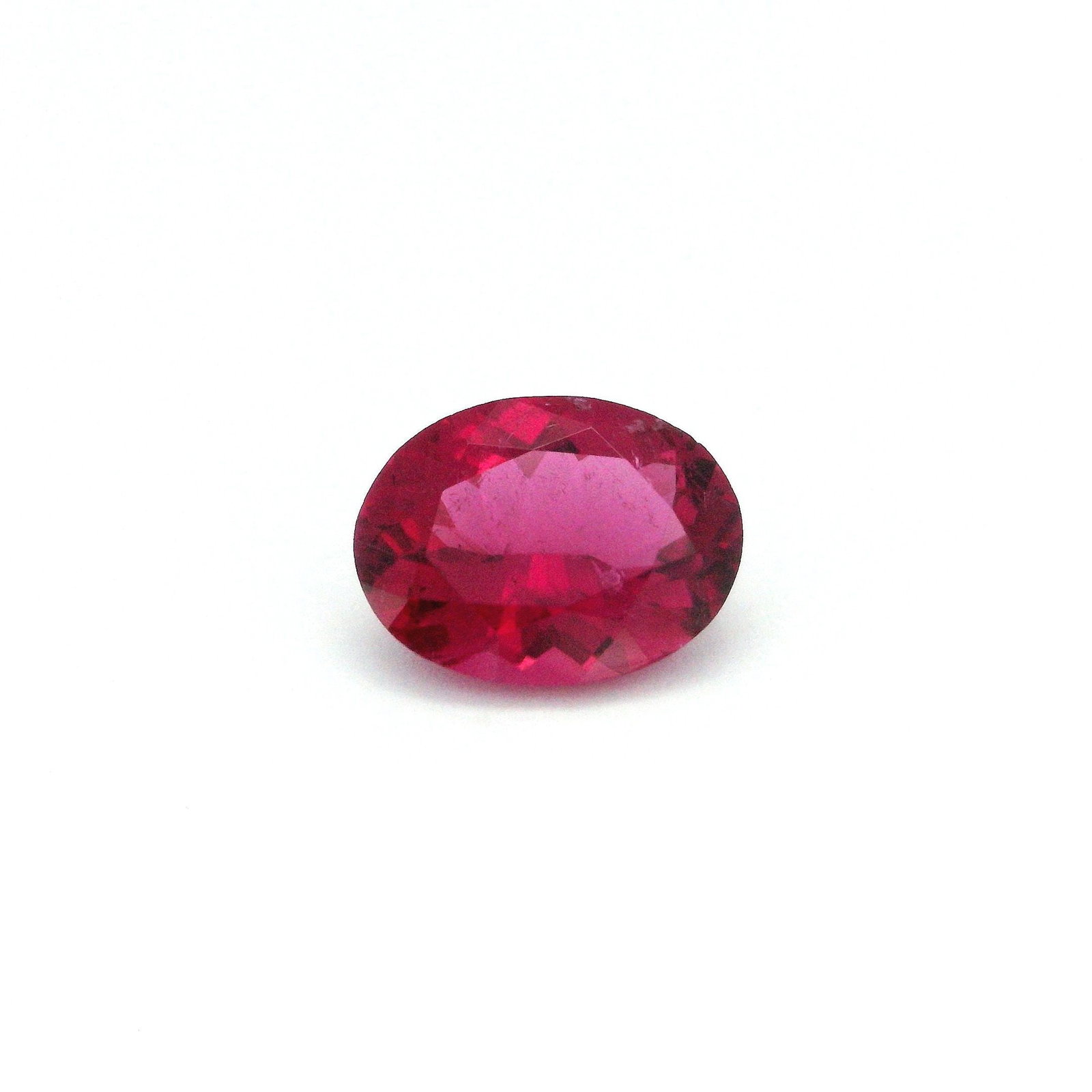 Loose Tourmaline Gemstone - GSI Oval 1.58ct Red SI: Loose Tourmaline Gemstone - GSI Oval 1.58ct Red SI This listing features Loose Tourmaline Gemstone - GSI Oval 1.58ct Red SI. Item specifics are provided below. Item Specifics: Type: Tourmaline Carat:
