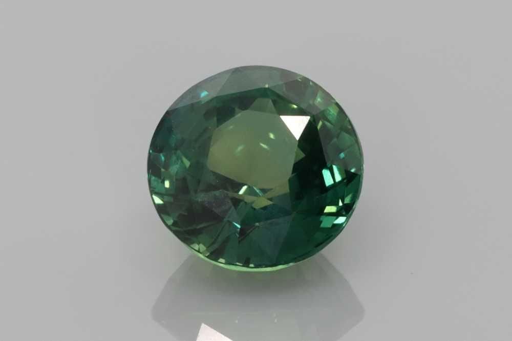 Loose Sapphire Gemstone - Round 3.0ct Teal EC: Loose Sapphire Gemstone - Round 3.0ct Teal EC This listing features Loose Sapphire Gemstone - Round 3.0ct Teal EC. Item specifics are provided below. Item Specifics: Type: Sapphire Carat: 3.0 Cut: Fac