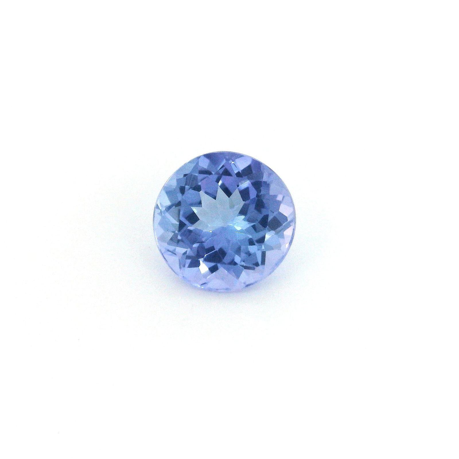 Loose Tanzanite Gemstone - GSI Round 2.1ct Blue EC: Loose Tanzanite Gemstone - GSI Round 2.1ct Blue EC This listing features Loose Tanzanite Gemstone - GSI Round 2.1ct Blue EC. Item specifics are provided below. Item Specifics: Type: Tanzanite Carat: 2