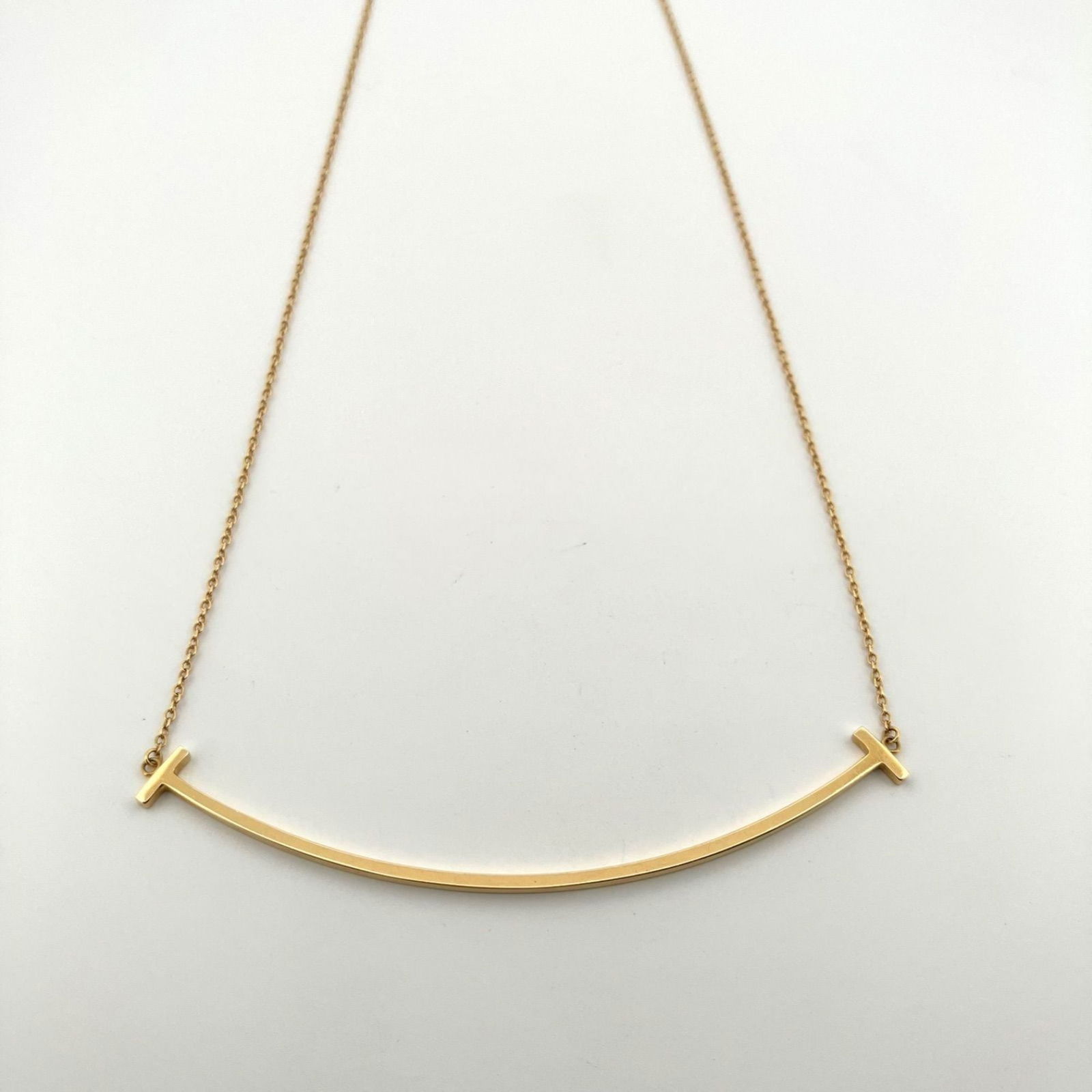 (60011652) TIFFANY & CO. Tiffany T Smile Large Necklace in Au750 and K18YG: (60011652) TIFFANY & CO. Tiffany T Smile Large Necklace in Au750 and K18YG This listing features (60011652) TIFFANY & CO. Tiffany T Smile Large Necklace in Au750 and K18YG. Item specifics are