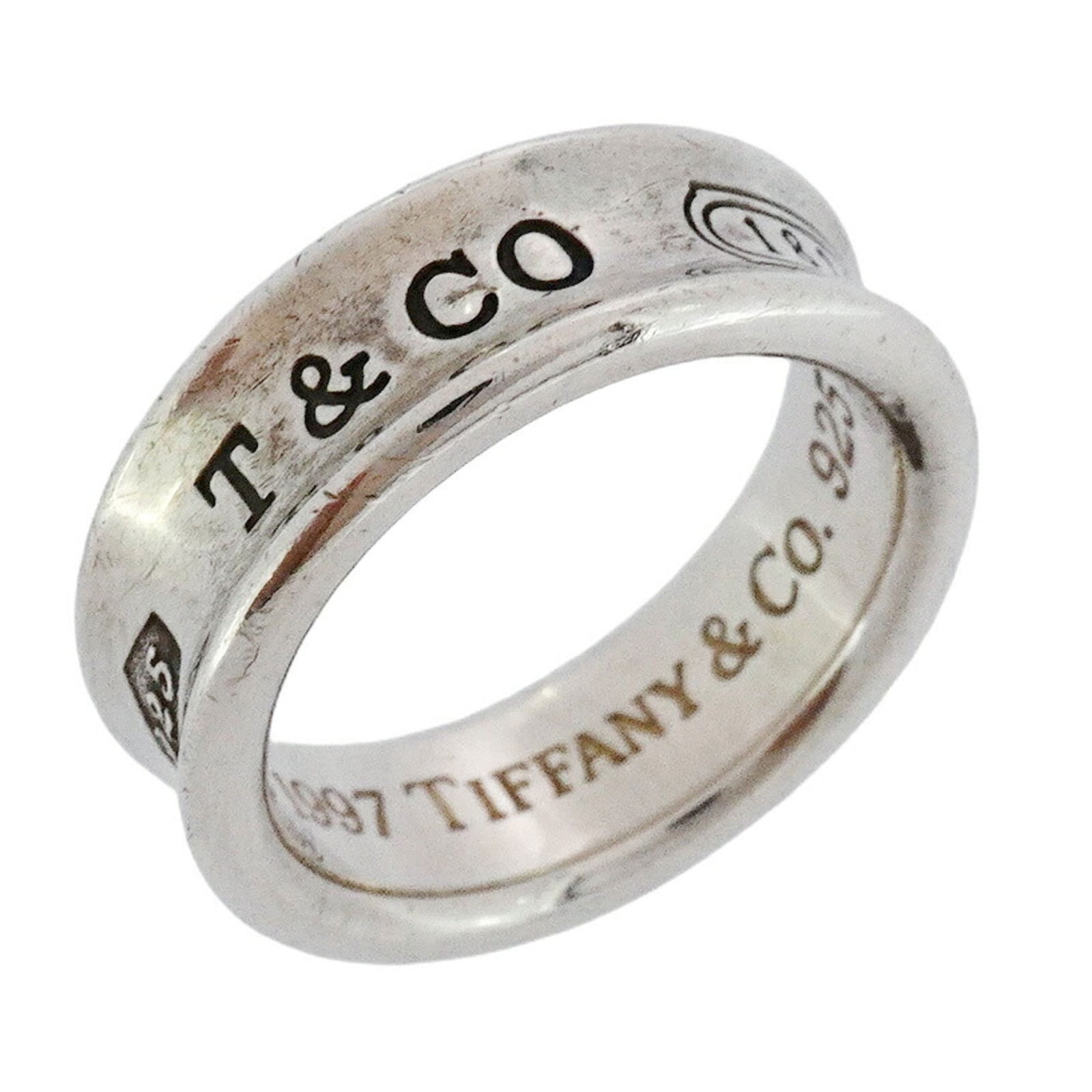 925 Tiffany Band Ring Silver: 925 Tiffany Band Ring Silver This listing features 925 Tiffany Band Ring Silver. Item specifics are provided below. Item Specifics: Brand: Tiffany Type: Band Ring Gender: Women Material: Silver 925 Us