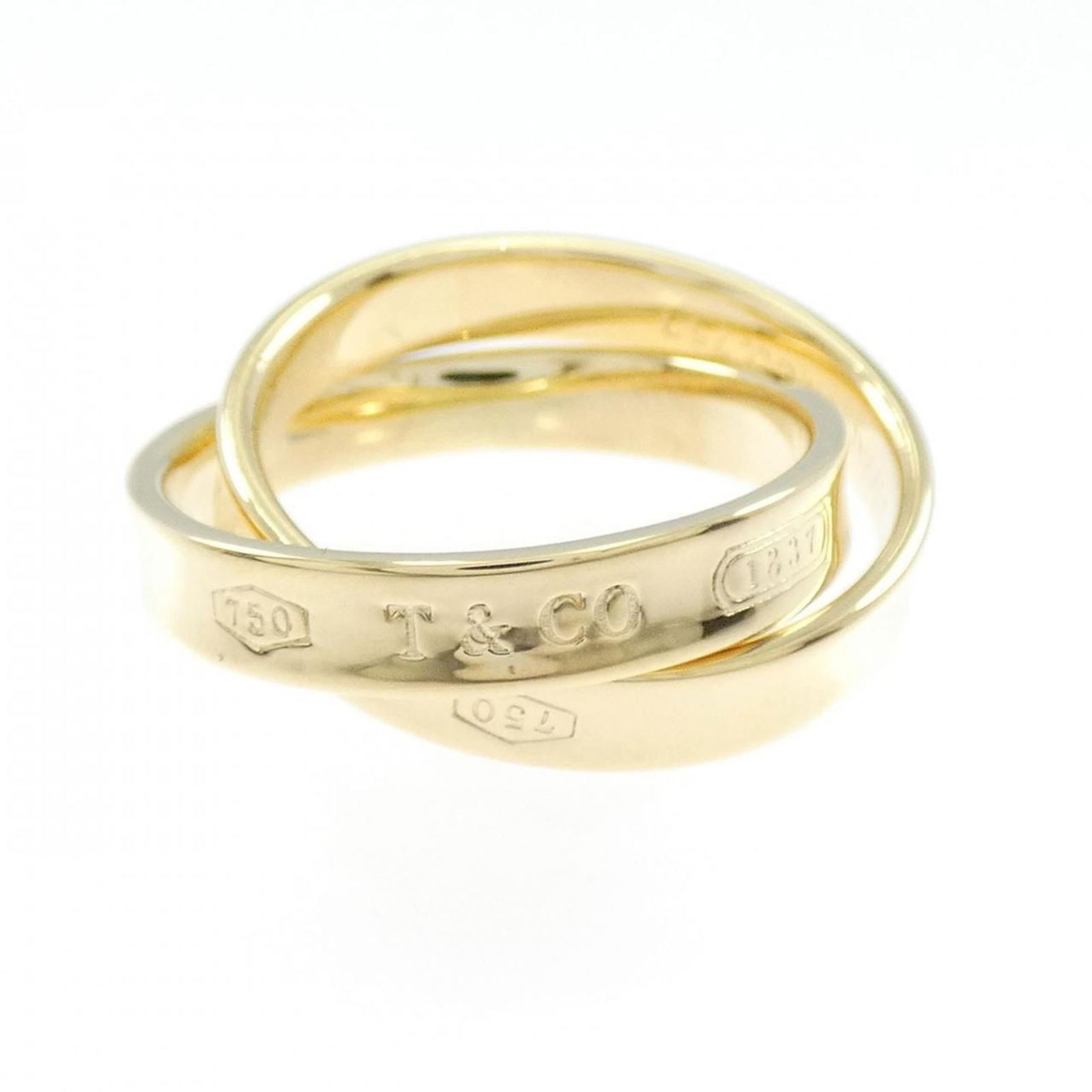 (18K) Tiffany Band Ring Yellow Gold: (18K) Tiffany Band Ring Yellow Gold This listing features (18K) Tiffany Band Ring Yellow Gold. Item specifics are provided below. Item Specifics: Brand: Tiffany Type: Band Ring Gender: Women Material: