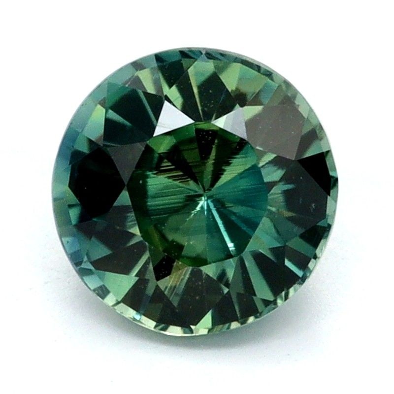 Loose Sapphire Gemstone - Round 1.08ct Teal EC: Loose Sapphire Gemstone - Round 1.08ct Teal EC This listing features Loose Sapphire Gemstone - Round 1.08ct Teal EC. Item specifics are provided below. Item Specifics: Type: Sapphire Carat: 1.08 Cut: