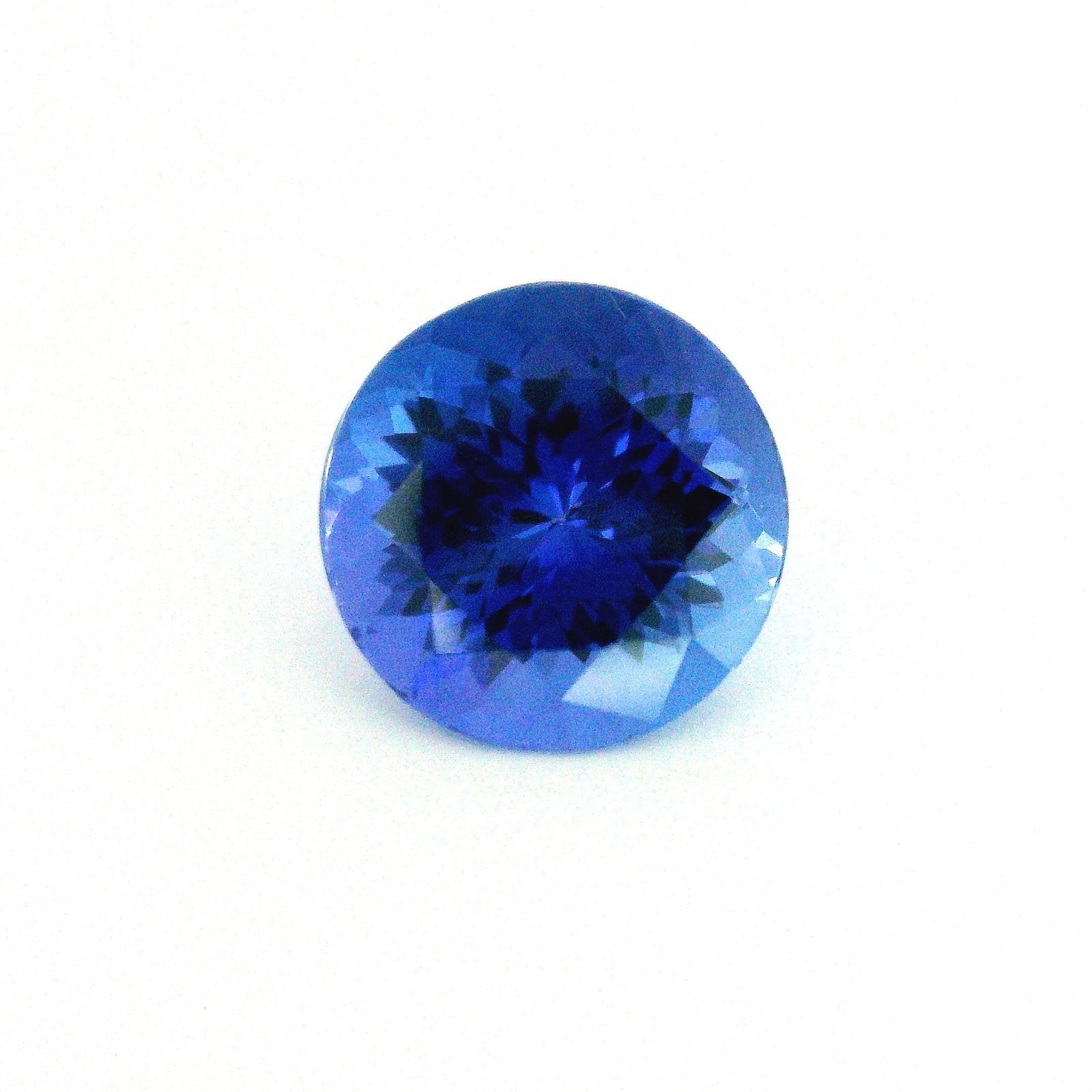 Loose Tanzanite Gemstone - GSI Round 4.49ct Blue EC: Loose Tanzanite Gemstone - GSI Round 4.49ct Blue EC This listing features Loose Tanzanite Gemstone - GSI Round 4.49ct Blue EC. Item specifics are provided below. Item Specifics: Type: Tanzanite