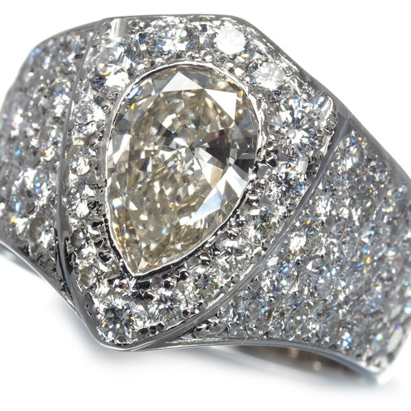 Platinum Diamond 1.188Ct/ 1.67Ct Pear-Shaped Paved Ring 900: Platinum Diamond 1.188Ct/ 1.67Ct Pear-Shaped Paved Ring 900 This listing features Platinum Diamond 1.188Ct/ 1.67Ct Pear-Shaped Paved Ring 900. Item specifics are provided below. Item Specifics: Metal: