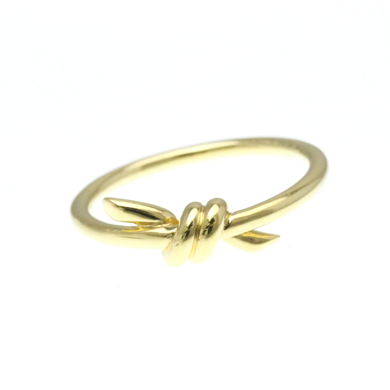 (18K) Tiffany Band Ring Yellow Gold: (18K) Tiffany Band Ring Yellow Gold This listing features (18K) Tiffany Band Ring Yellow Gold. Item specifics are provided below. Item Specifics: Brand: Tiffany Type: Band Ring Style: Fashion Gender:
