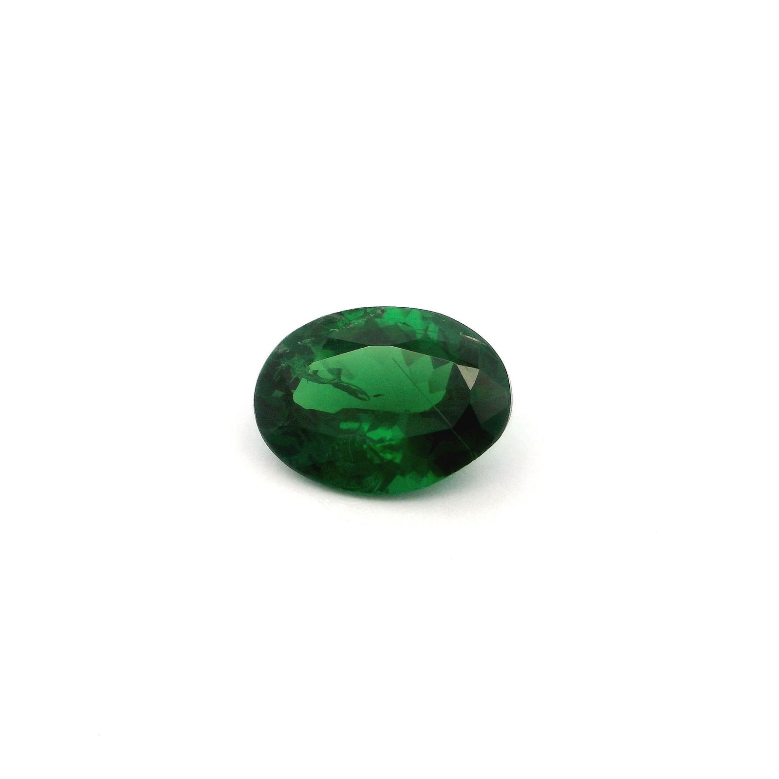 Loose Garnet Gemstone - GSI Oval 1.36ct Green SI: Loose Garnet Gemstone - GSI Oval 1.36ct Green SI This listing features Loose Garnet Gemstone - GSI Oval 1.36ct Green SI. Item specifics are provided below. Item Specifics: Type: Garnet Carat: 1.36 Cut