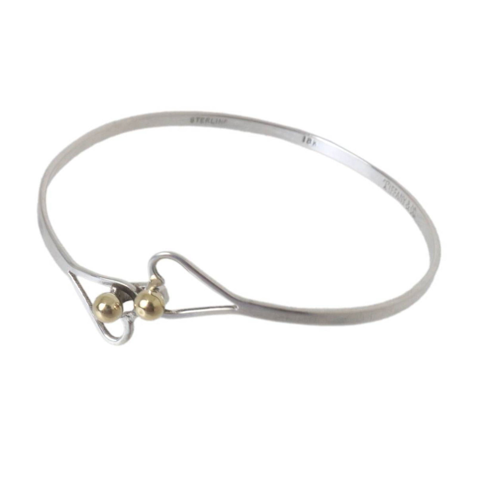 Sterling Silver - Tiffany Bangle Gold (18K): Sterling Silver - Tiffany Bangle Gold (18K) This listing features Sterling Silver - Tiffany Bangle Gold (18K). Item specifics are provided below. Item Specifics: Brand: Tiffany Type: Bangle Gender: Me