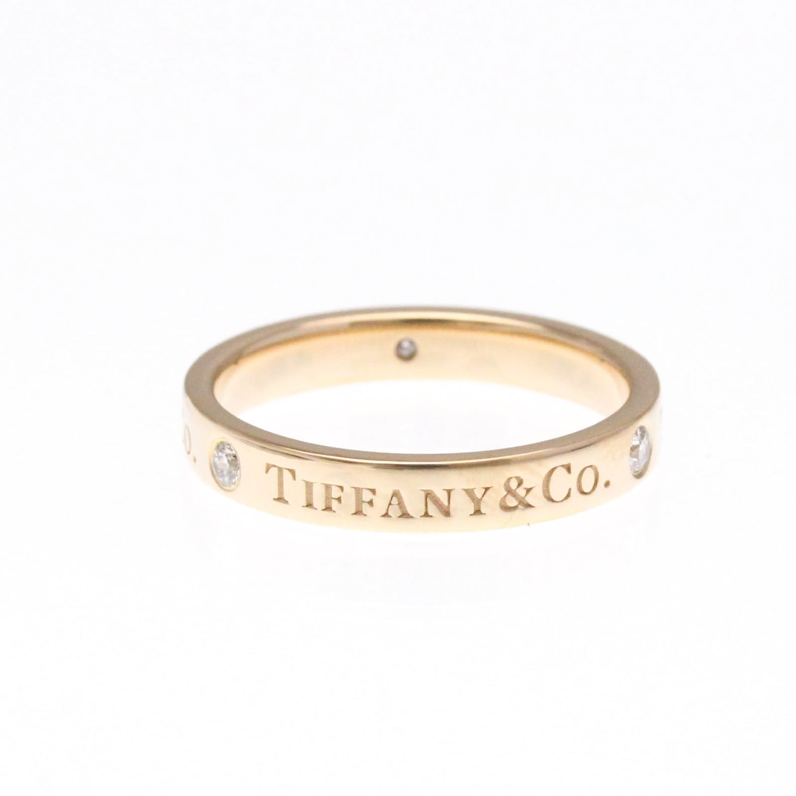 (18K) Tiffany Band Ring Pink Gold: (18K) Tiffany Band Ring Pink Gold This listing features (18K) Tiffany Band Ring Pink Gold. Item specifics are provided below. Item Specifics: Brand: Tiffany Type: Band Ring Style: Fashion Gender: Wome