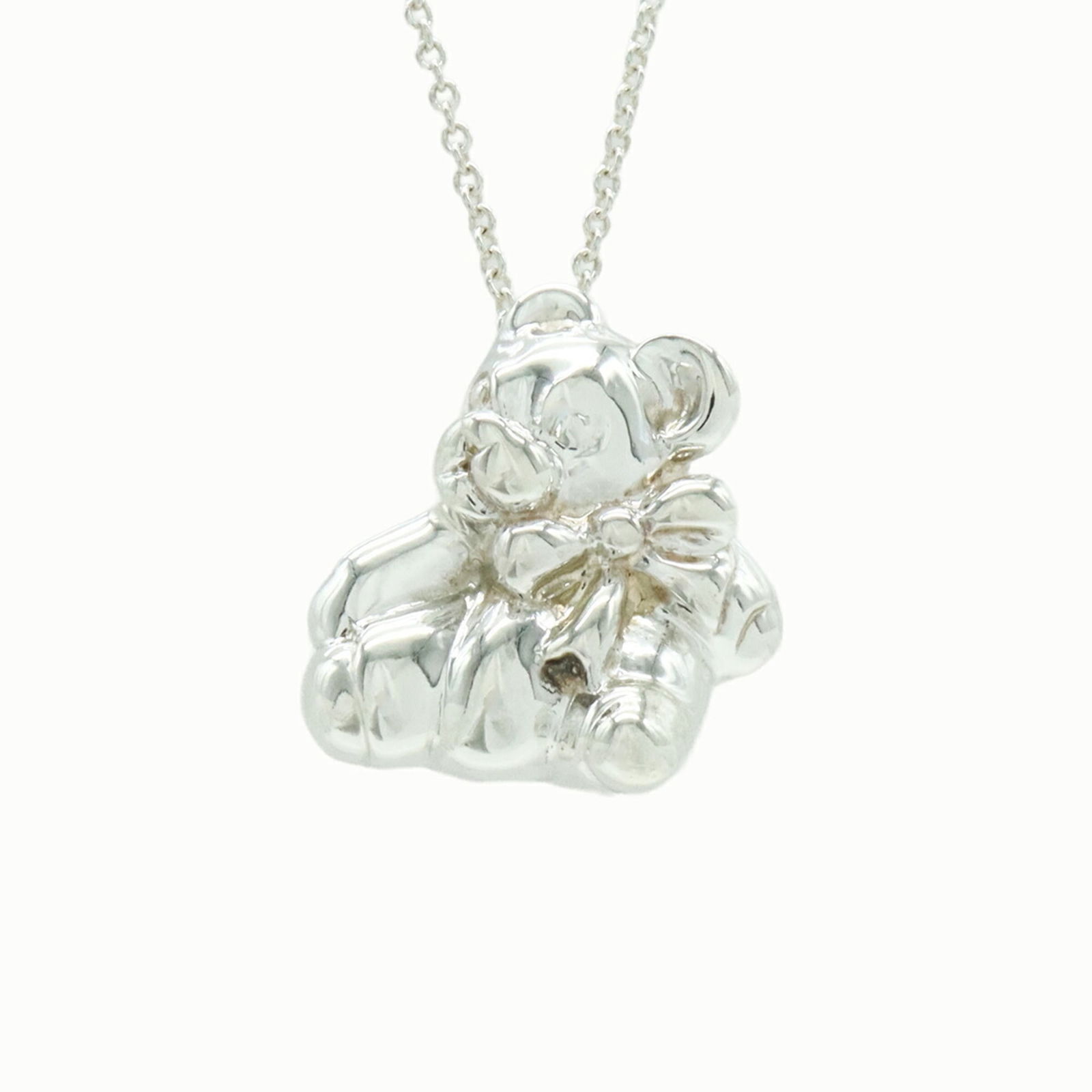 Silver TIFFANY & Co. Tiffany Elsa Peretti Teddy Bear Necklace Pendant in 925 Sterling: Silver TIFFANY & Co. Tiffany Elsa Peretti Teddy Bear Necklace Pendant in 925 Sterling This listing features Silver TIFFANY & Co. Tiffany Elsa Peretti Teddy Bear Necklace Pendant in 925 Sterling. Item