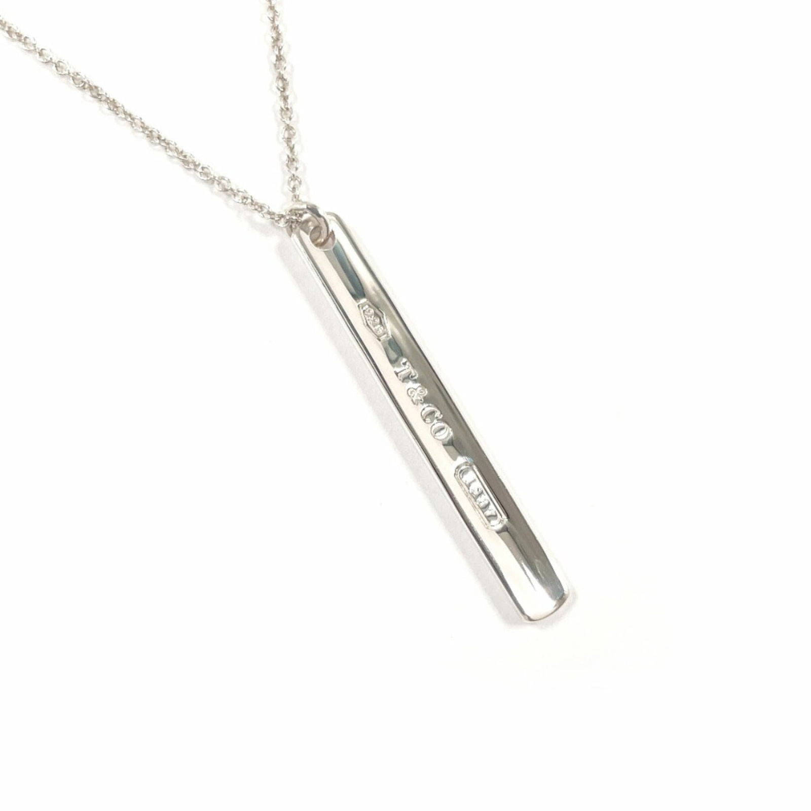 Unisex - TIFFANY & Co. 1837 Narrow Bar Pendant Necklace in Sterling Silver: Unisex - TIFFANY & Co. 1837 Narrow Bar Pendant Necklace in Sterling Silver This listing features Unisex - TIFFANY & Co. 1837 Narrow Bar Pendant Necklace in Sterling Silver. Item specifics are provided