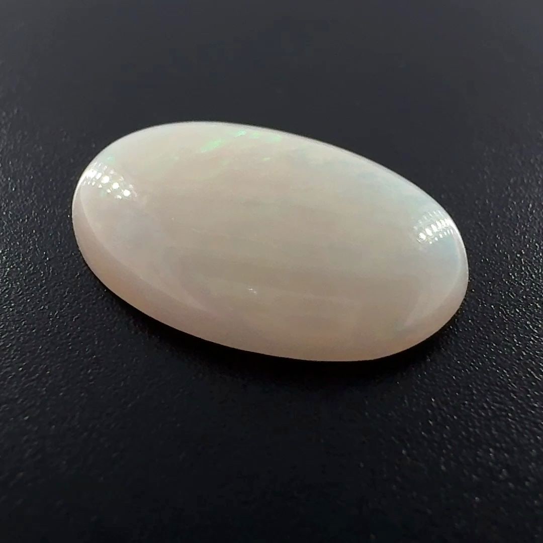 Loose Opal Gemstone - Oval 4.15ct White EC: Loose Opal Gemstone - Oval 4.15ct White EC This listing features Loose Opal Gemstone - Oval 4.15ct White EC. Item specifics are provided below. Item Specifics: Type: Opal Carat: 4.15 Cut: Cabochon
