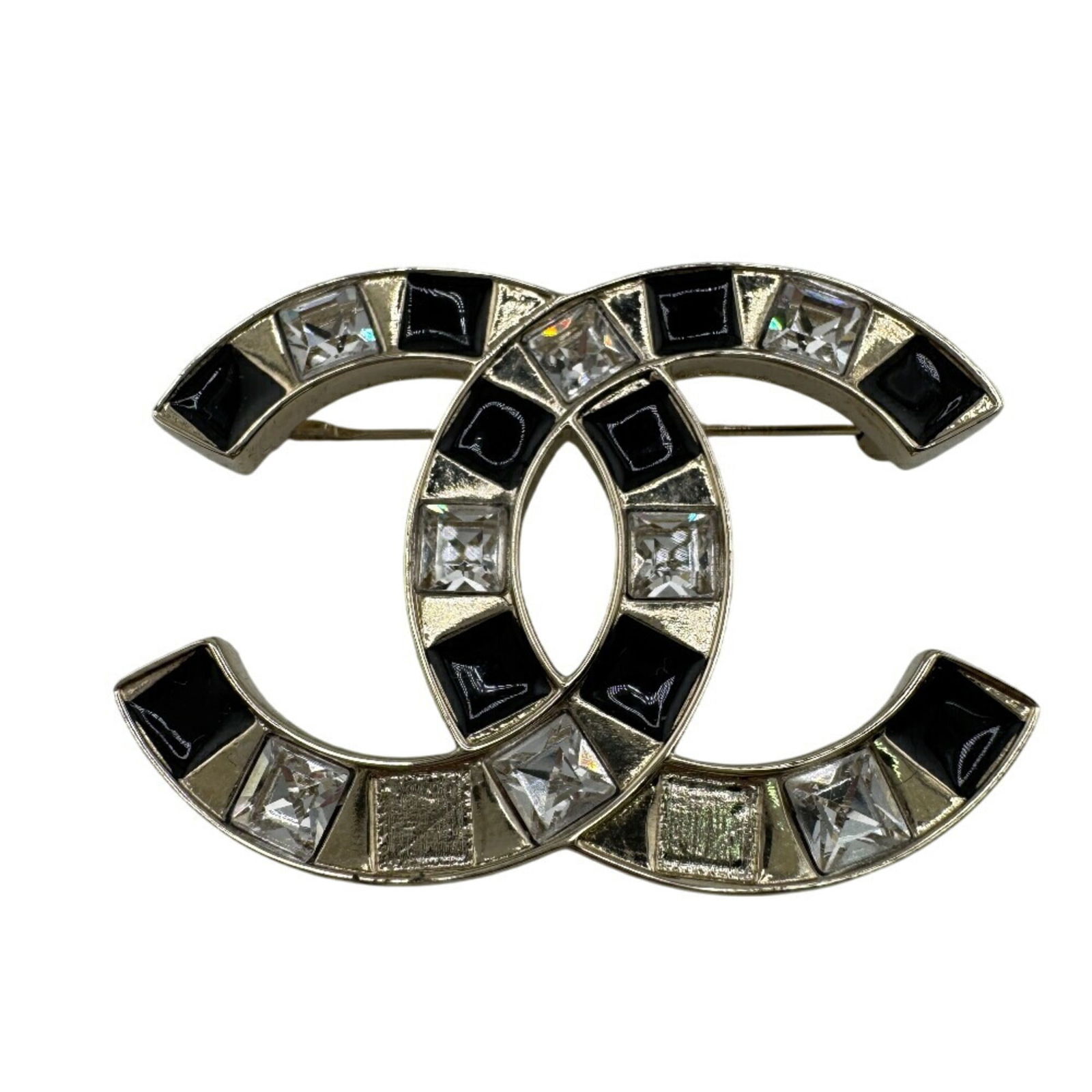 Brooch Chanel: Brooch Chanel This listing features Brooch Chanel. Item specifics are provided below. Item Specifics: Brand: Chanel Type: Brooch Gender: Women Finish: Gold Plated Color: Silver Stone: Rhinestone Size