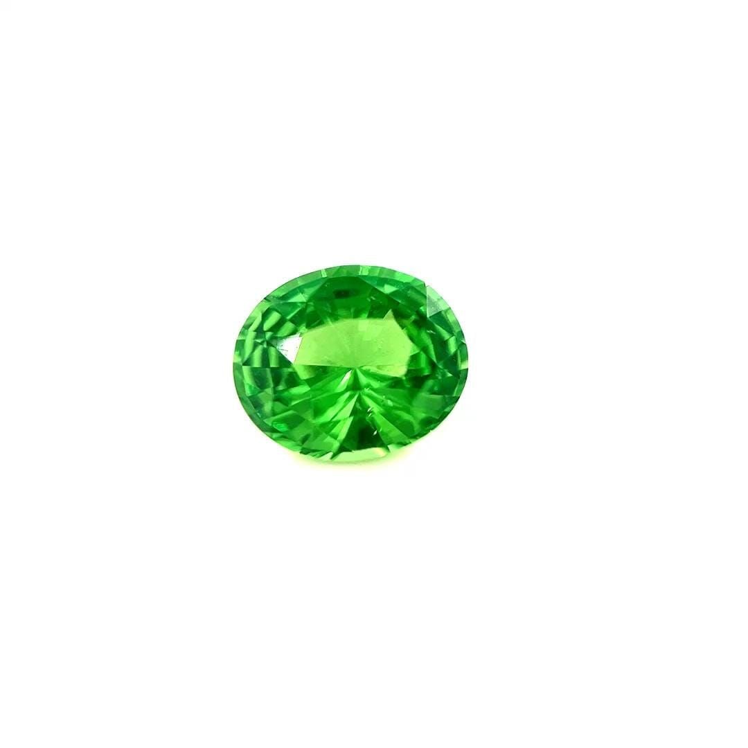 Loose Garnet Gemstone - Oval 1.22ct Green SI: Loose Garnet Gemstone - Oval 1.22ct Green SI This listing features Loose Garnet Gemstone - Oval 1.22ct Green SI. Item specifics are provided below. Item Specifics: Type: Garnet Carat: 1.22 Cut: