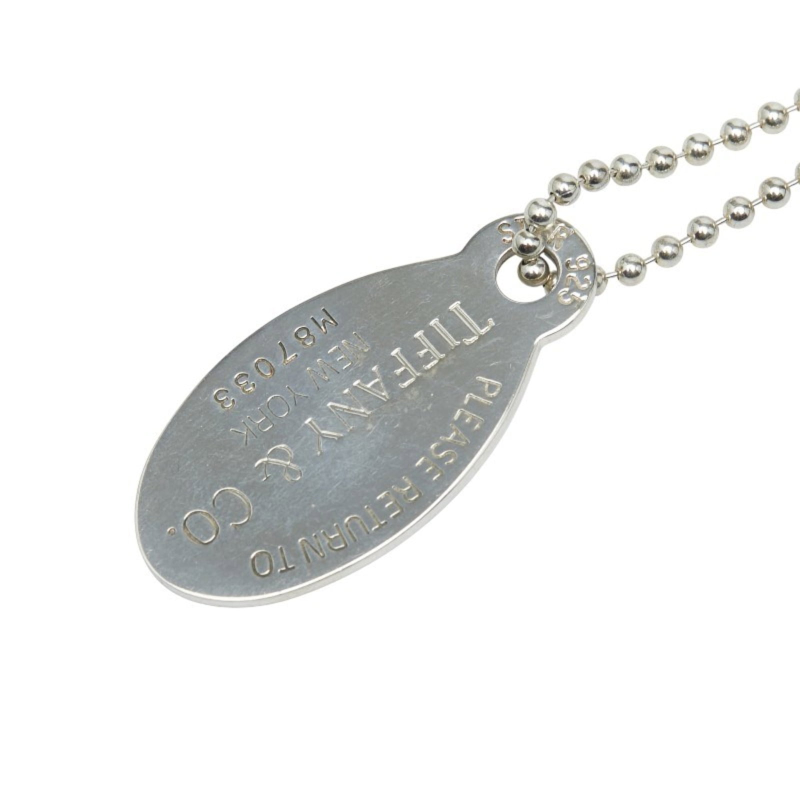 TIFFANY & Co. Return to Oval Tag Necklace in 925 Sterling Silver for Women.: TIFFANY & Co. Return to Oval Tag Necklace in 925 Sterling Silver for Women. This listing features TIFFANY & Co. Return to Oval Tag Necklace in 925 Sterling Silver for Women.. Item specifics are provid