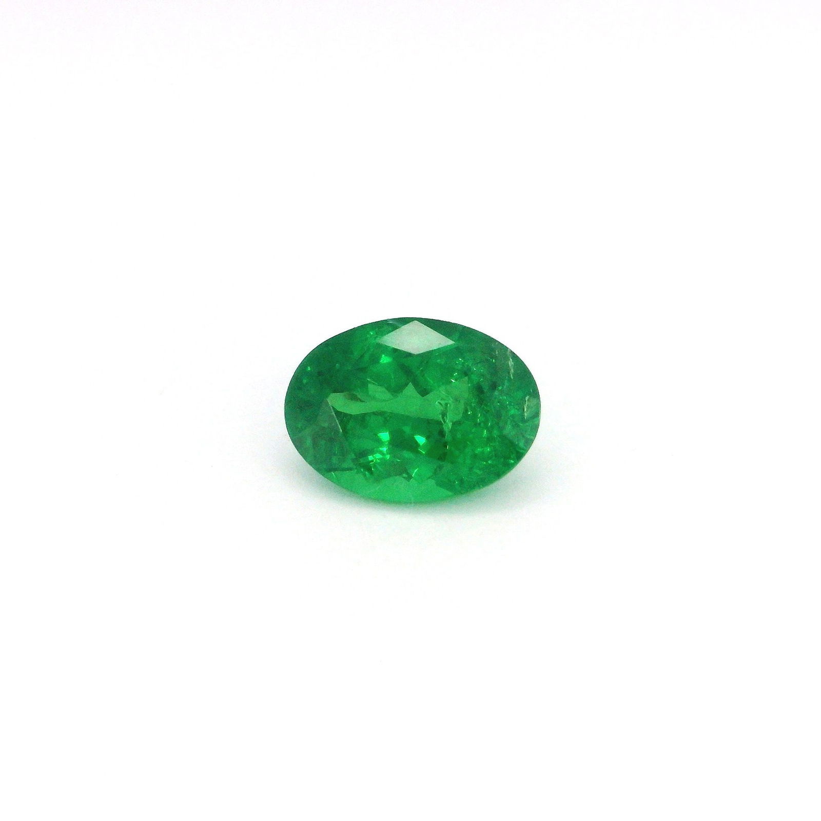 Loose Garnet Gemstone - GSI Oval 1.41ct Green SI: Loose Garnet Gemstone - GSI Oval 1.41ct Green SI This listing features Loose Garnet Gemstone - GSI Oval 1.41ct Green SI. Item specifics are provided below. Item Specifics: Type: Garnet Carat: 1.41 Cut