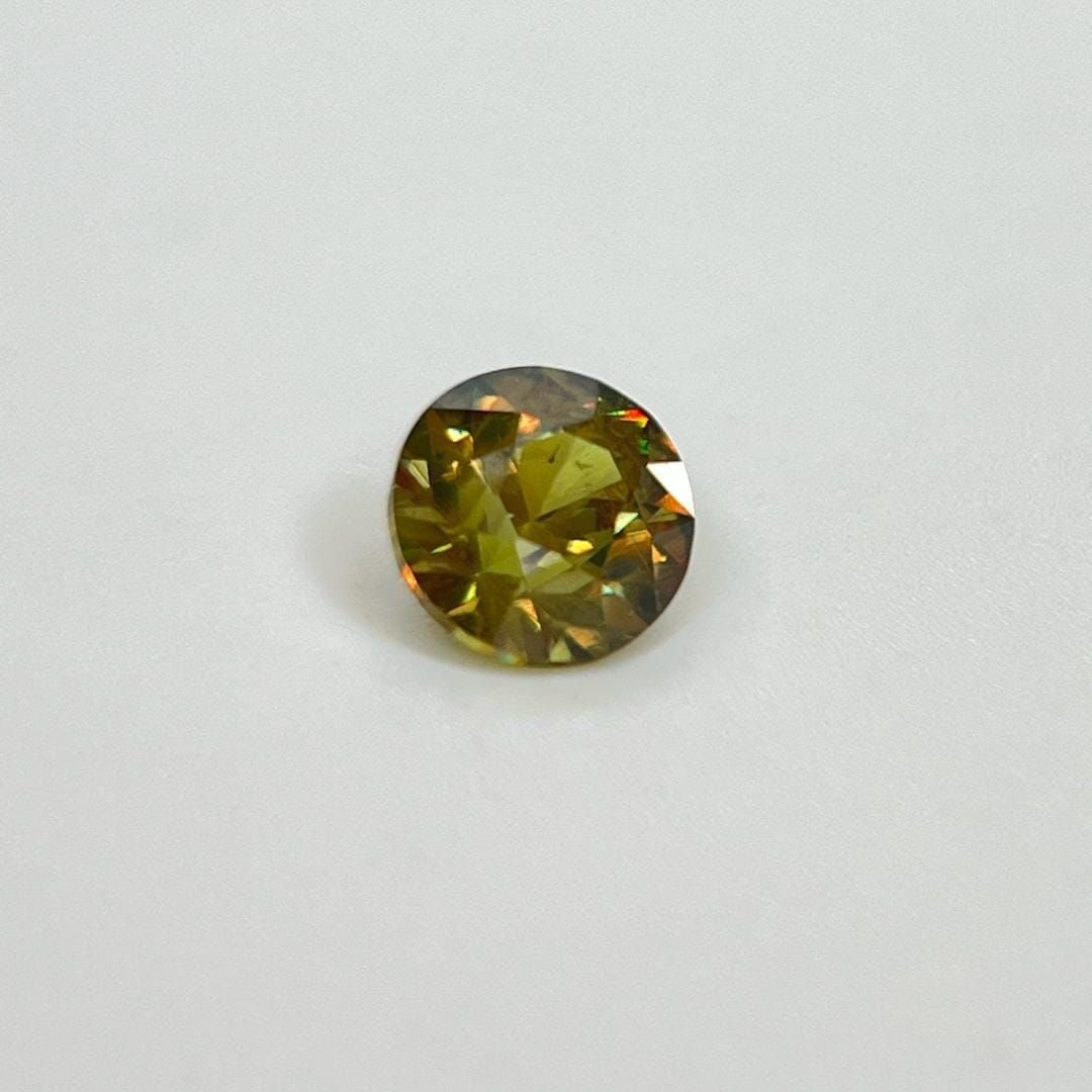 Loose Garnet Gemstone - Round 1.5ct Green SI: Loose Garnet Gemstone - Round 1.5ct Green SI This listing features Loose Garnet Gemstone - Round 1.5ct Green SI. Item specifics are provided below. Item Specifics: Type: Garnet Carat: 1.5 Cut: Faceted