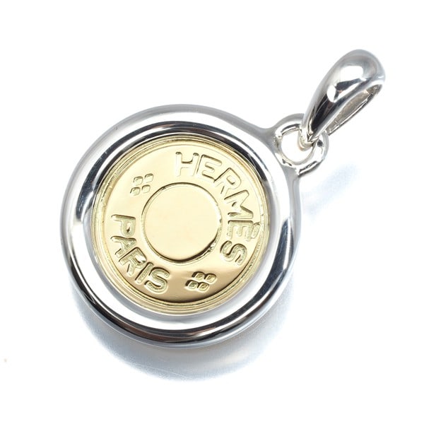 Silver Hermes Pendant Clou De Selle 18K 750 Yellow Gold/ 925 Sterling: Silver Hermes Pendant Clou De Selle 18K 750 Yellow Gold/ 925 Sterling This listing features Silver Hermes Pendant Clou De Selle 18K 750 Yellow Gold/ 925 Sterling. Item specifics are provided below. It