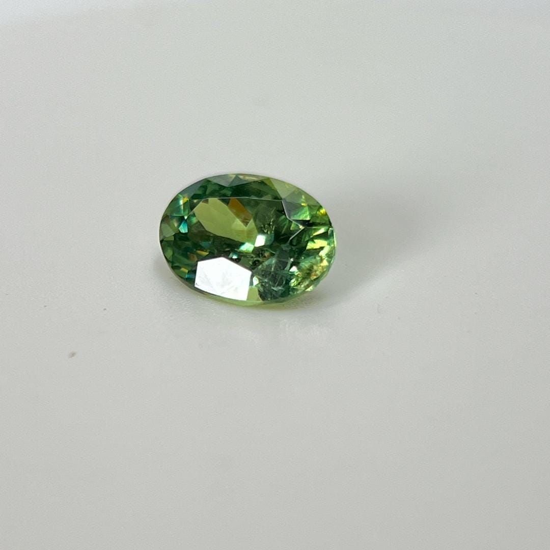 Loose Garnet Gemstone - Oval 2.01ct Green SI: Loose Garnet Gemstone - Oval 2.01ct Green SI This listing features Loose Garnet Gemstone - Oval 2.01ct Green SI. Item specifics are provided below. Item Specifics: Type: Garnet Carat: 2.01 Cut: