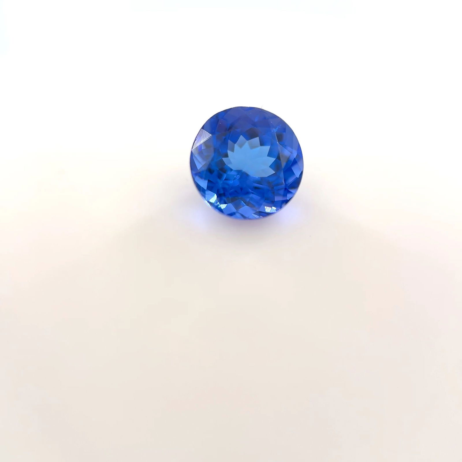 Loose Tanzanite Gemstone - Round 1.28ct Blue EC: Loose Tanzanite Gemstone - Round 1.28ct Blue EC This listing features Loose Tanzanite Gemstone - Round 1.28ct Blue EC. Item specifics are provided below. Item Specifics: Type: Tanzanite Carat: 1.28 Cu